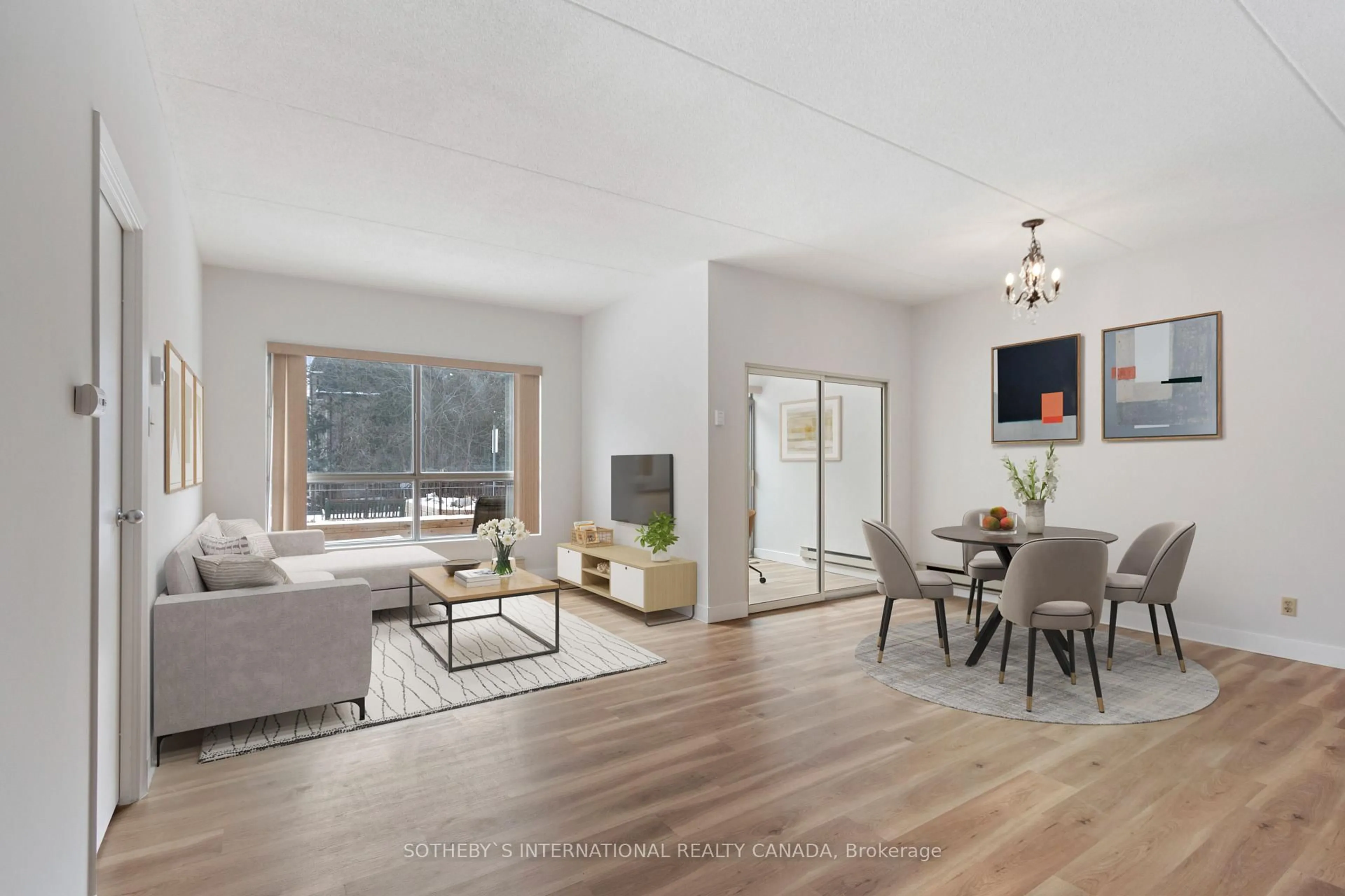 Living room with furniture, wood/laminate floor for 249 Major Mackenzie Dr #105, Richmond Hill Ontario L4C 9M8
