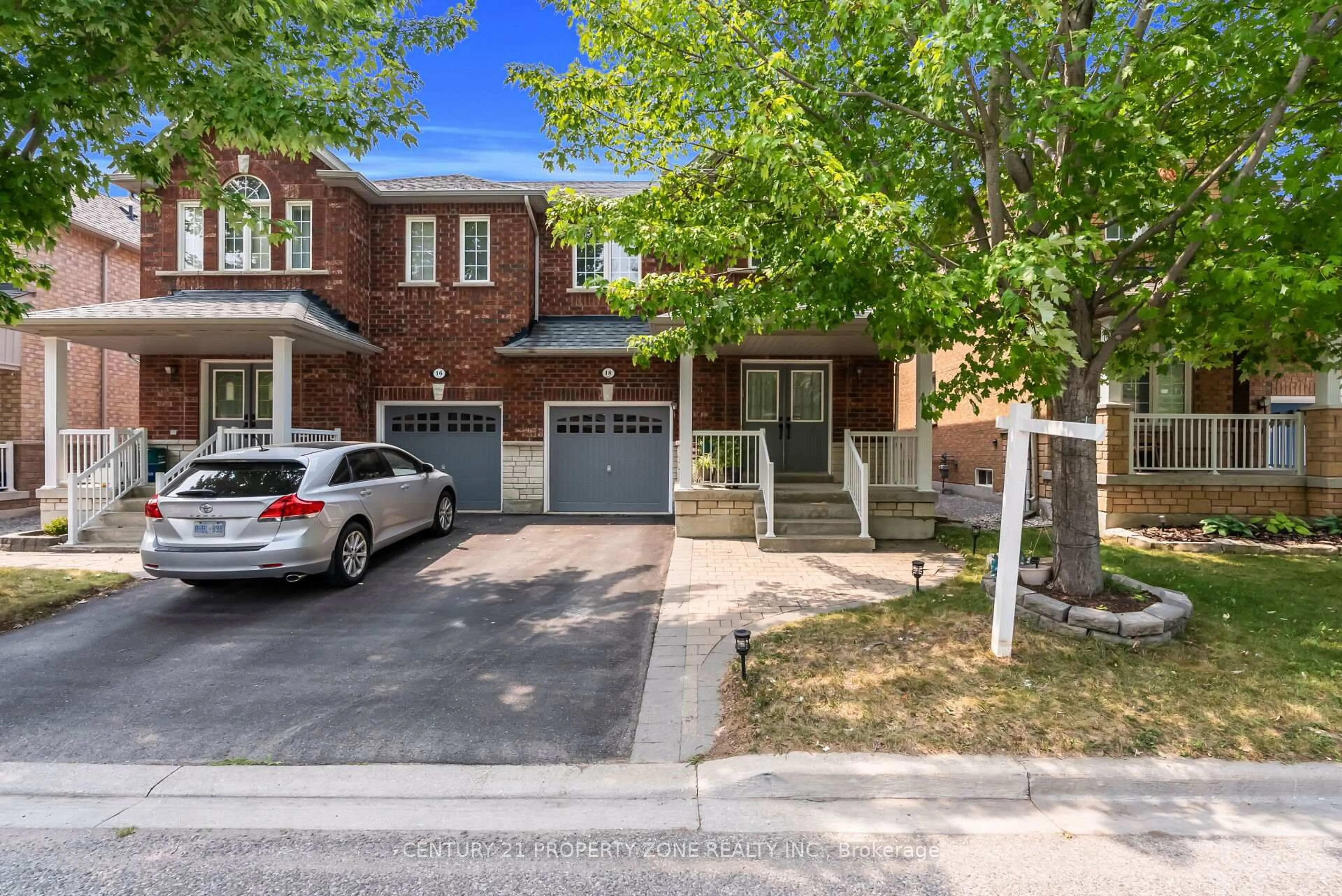 Home with brick exterior material, street for 18 Gracewell Rd, Markham Ontario L6E 1W9