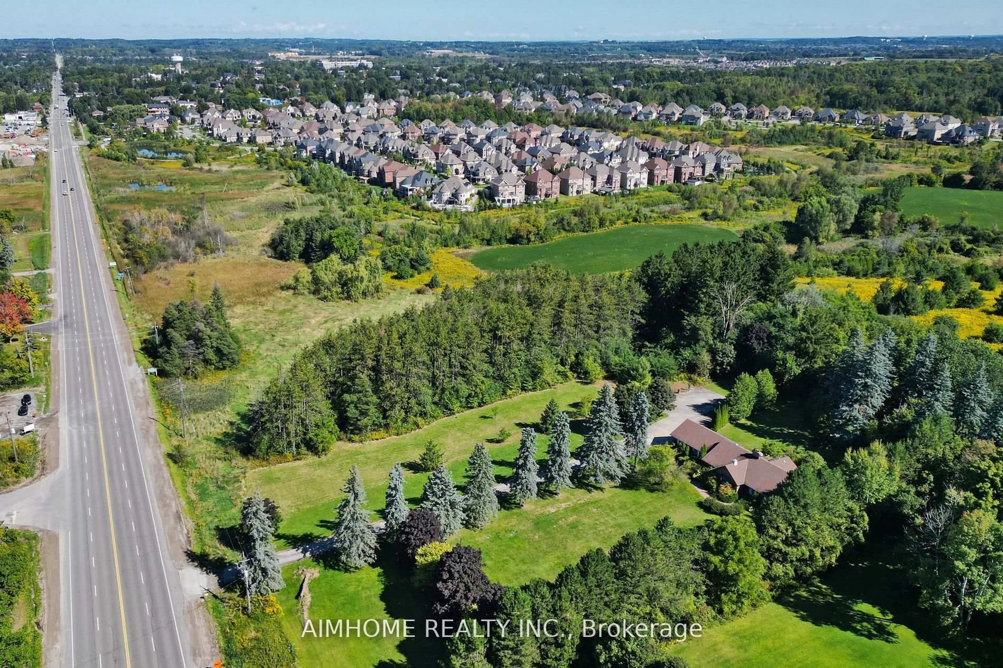 A pic from outside/outdoor area/front of a property/back of a property/a pic from drone, forest/trees view for 12301 Keele St, Vaughan Ontario L6A 2B3