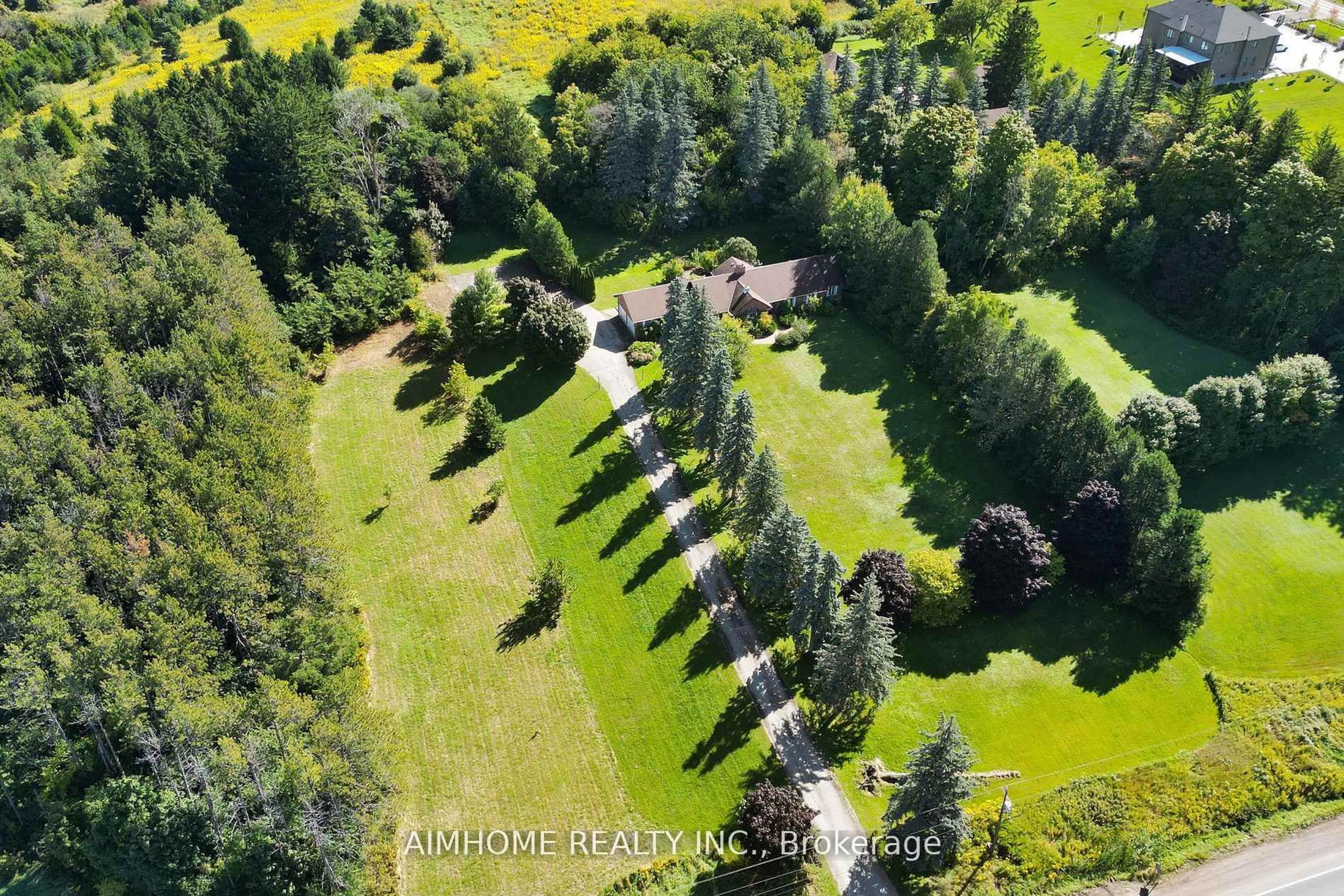 A pic from outside/outdoor area/front of a property/back of a property/a pic from drone, forest/trees view for 12301 Keele St, Vaughan Ontario L6A 2B3