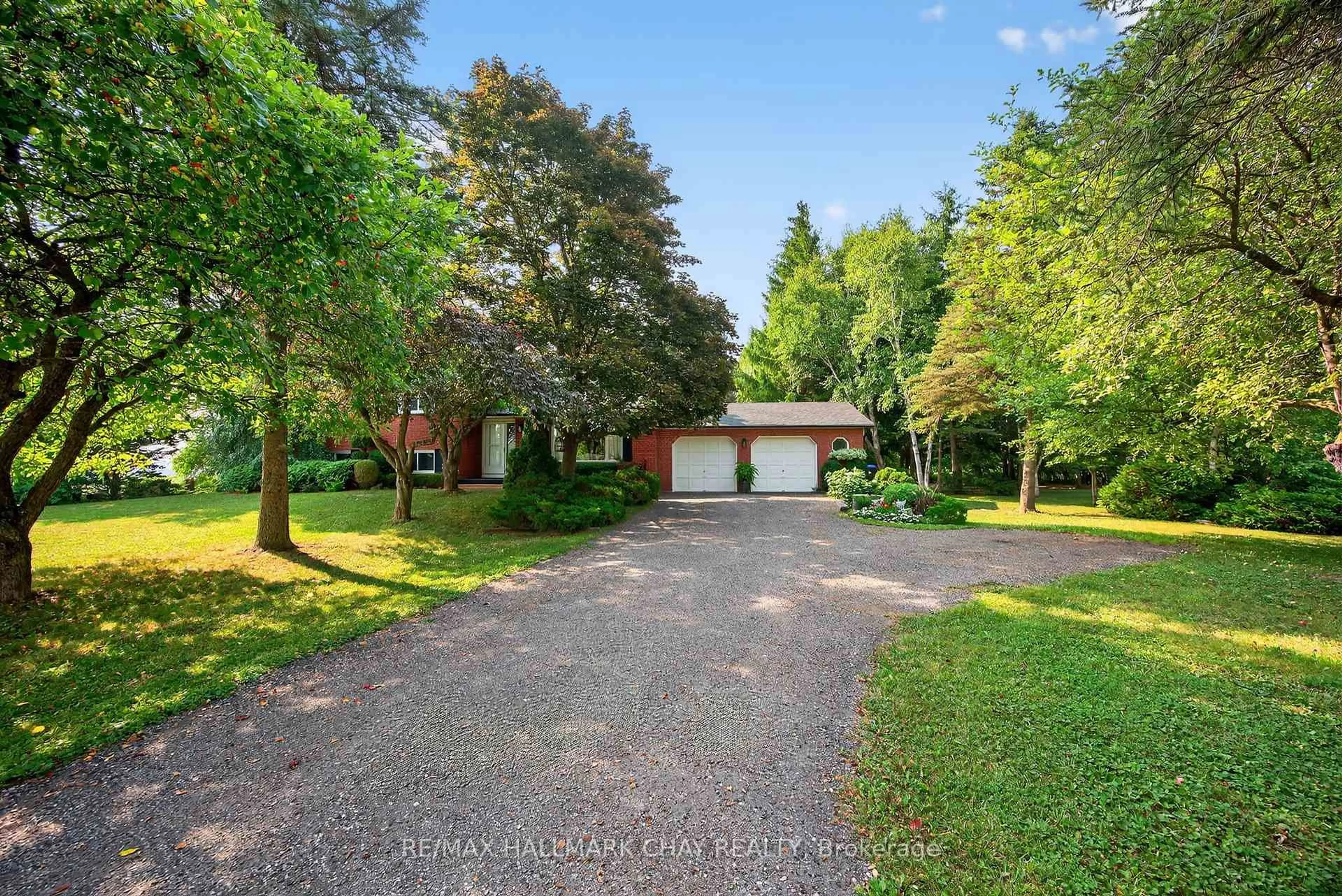 A pic from outside/outdoor area/front of a property/back of a property/a pic from drone, street for 5205 5th Line, New Tecumseth Ontario L0G 1W0