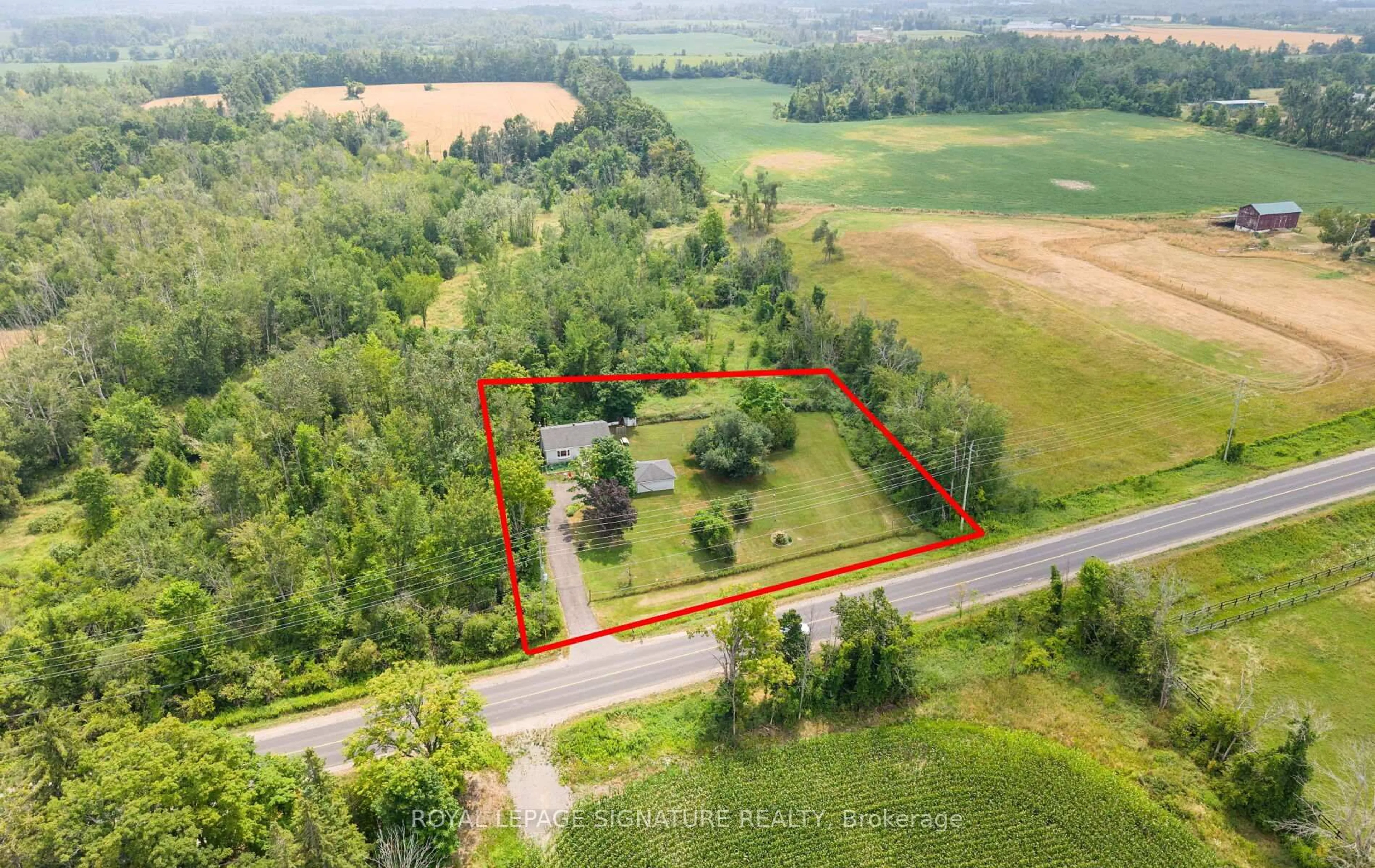 A pic from outside/outdoor area/front of a property/back of a property/a pic from drone, unknown for 1359 10th Line, Innisfil Ontario L9S 3N5