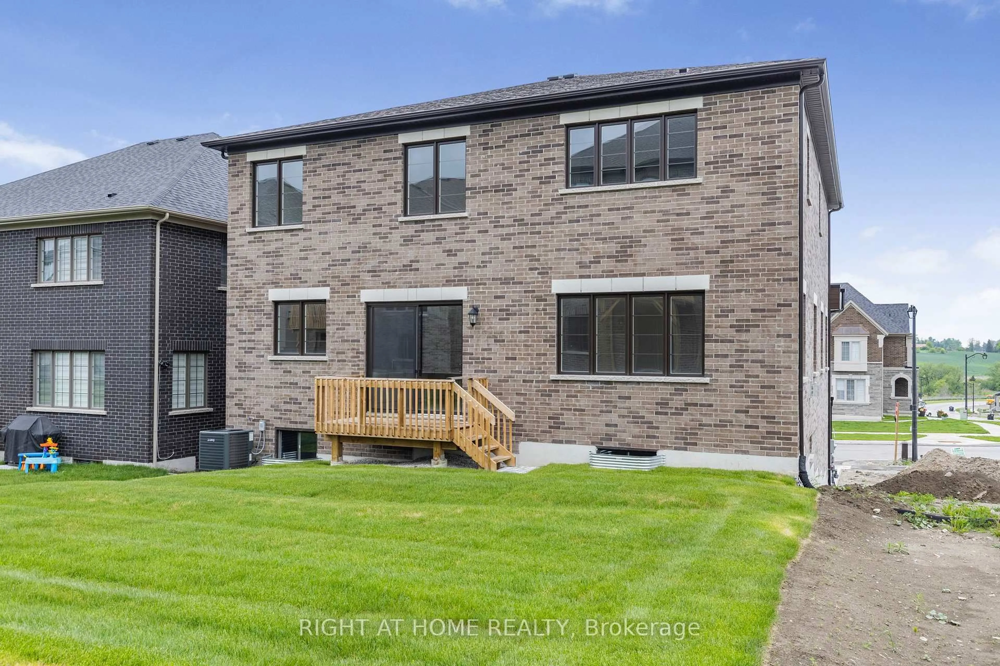 Home with brick exterior material, street for 59 Cunningham Dr, Bradford West Gwillimbury Ontario L0G 1B0