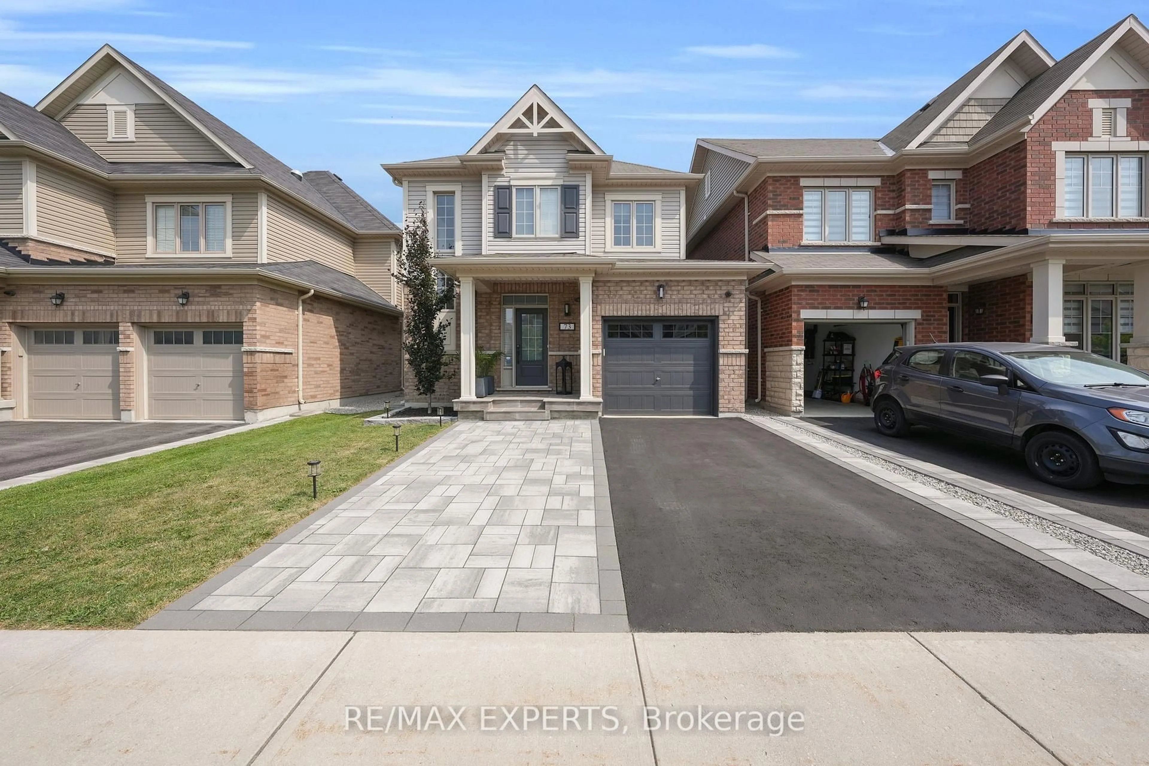 Home with brick exterior material, street for 73 Donnan Dr, New Tecumseth Ontario L0G 1W0