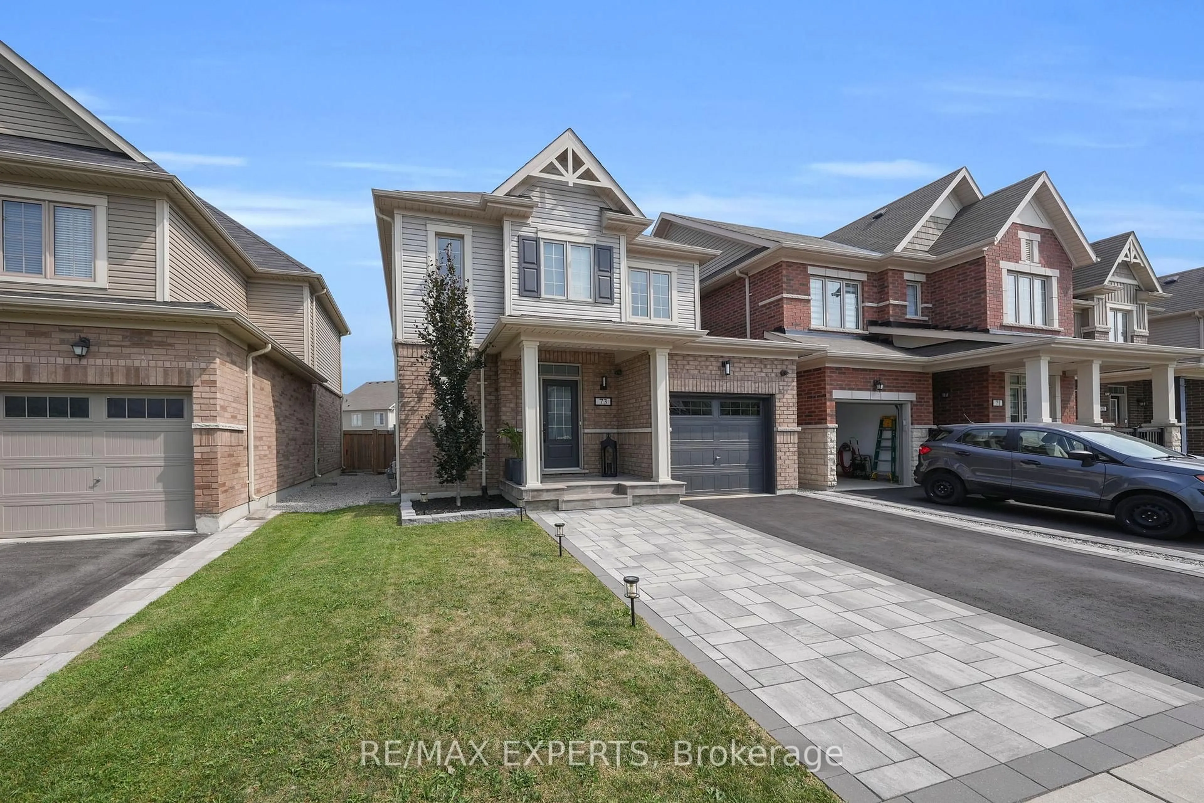 Home with brick exterior material, street for 73 Donnan Dr, New Tecumseth Ontario L0G 1W0