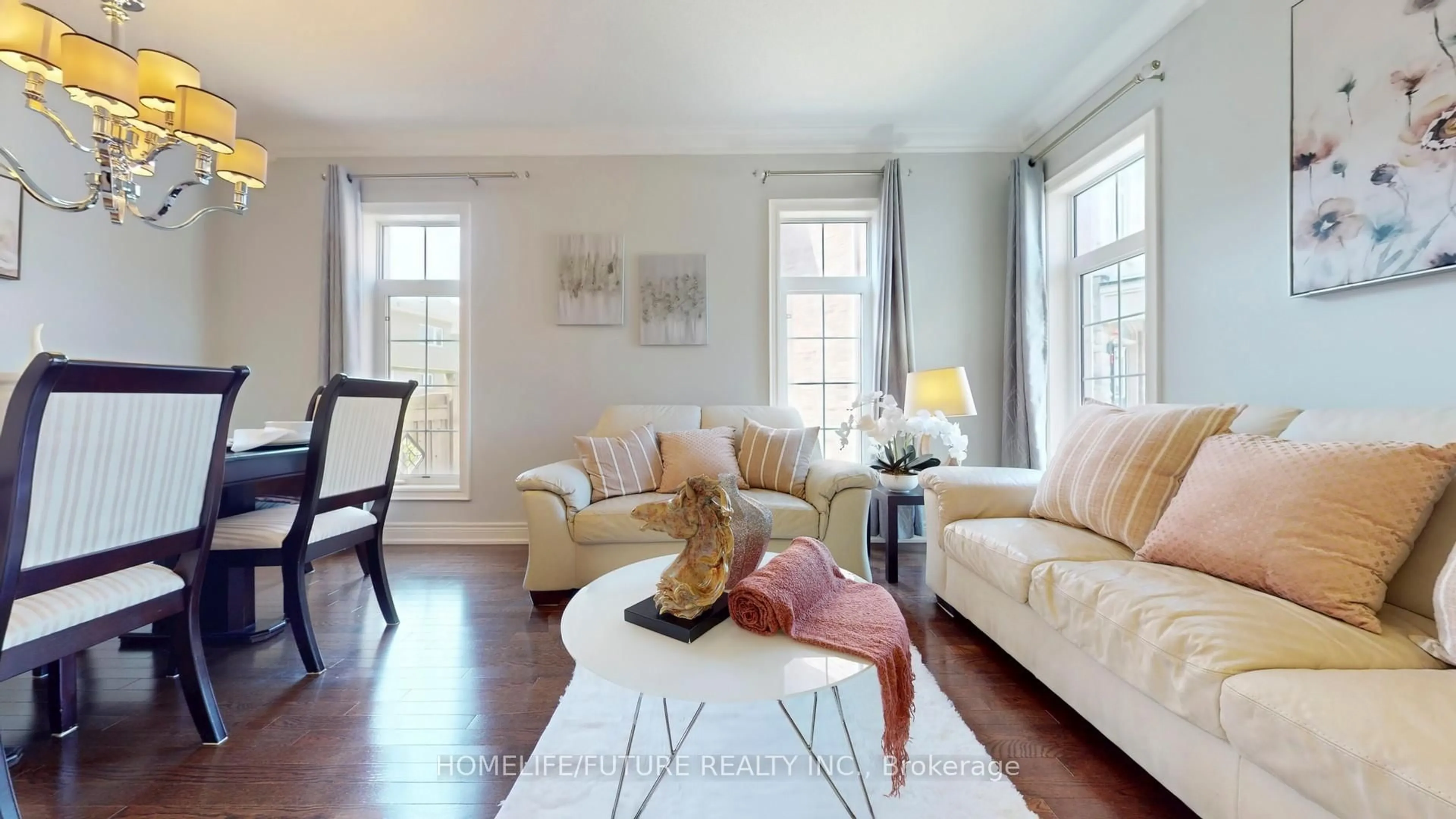 Living room with furniture, wood/laminate floor for 9 Beebe Cres, Markham Ontario L6E 0L6