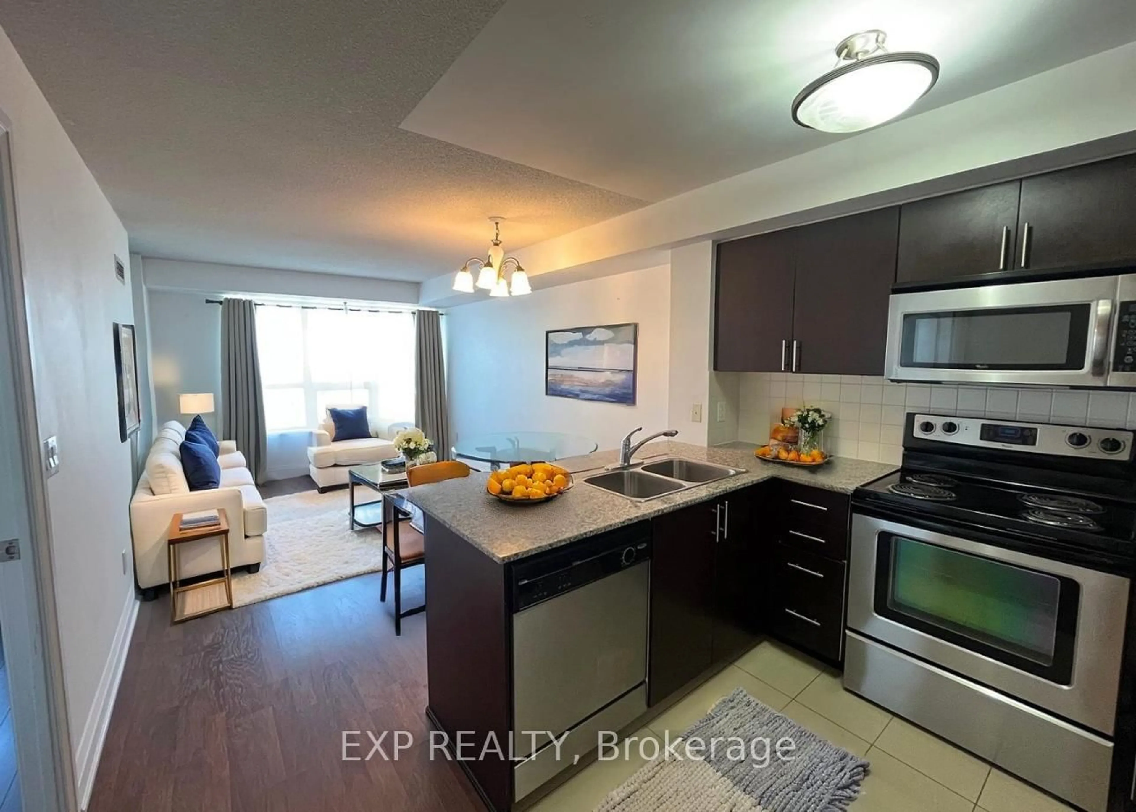 Open concept kitchen, wood/laminate floor for 30 North Park Rd #1410, Vaughan Ontario L4J 0G7