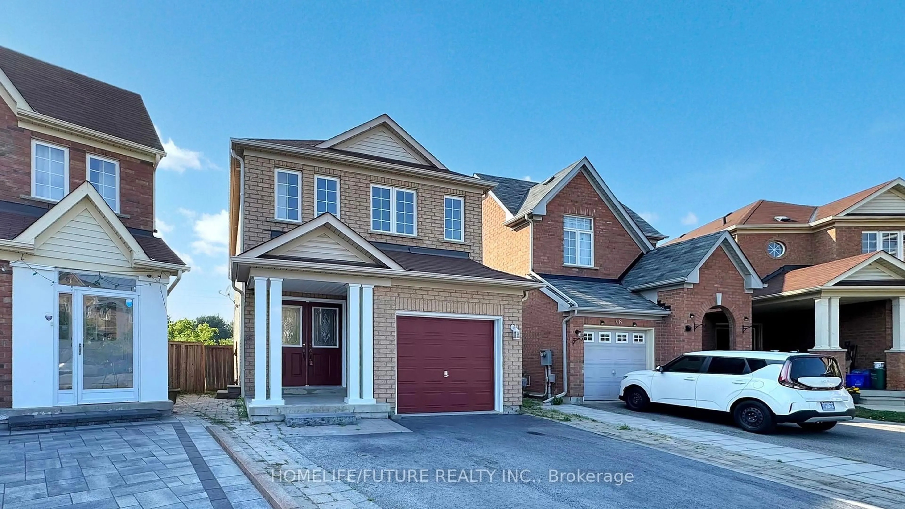 Home with brick exterior material, street for 46 Jack Monkman Cres, Markham Ontario L3S 0A3