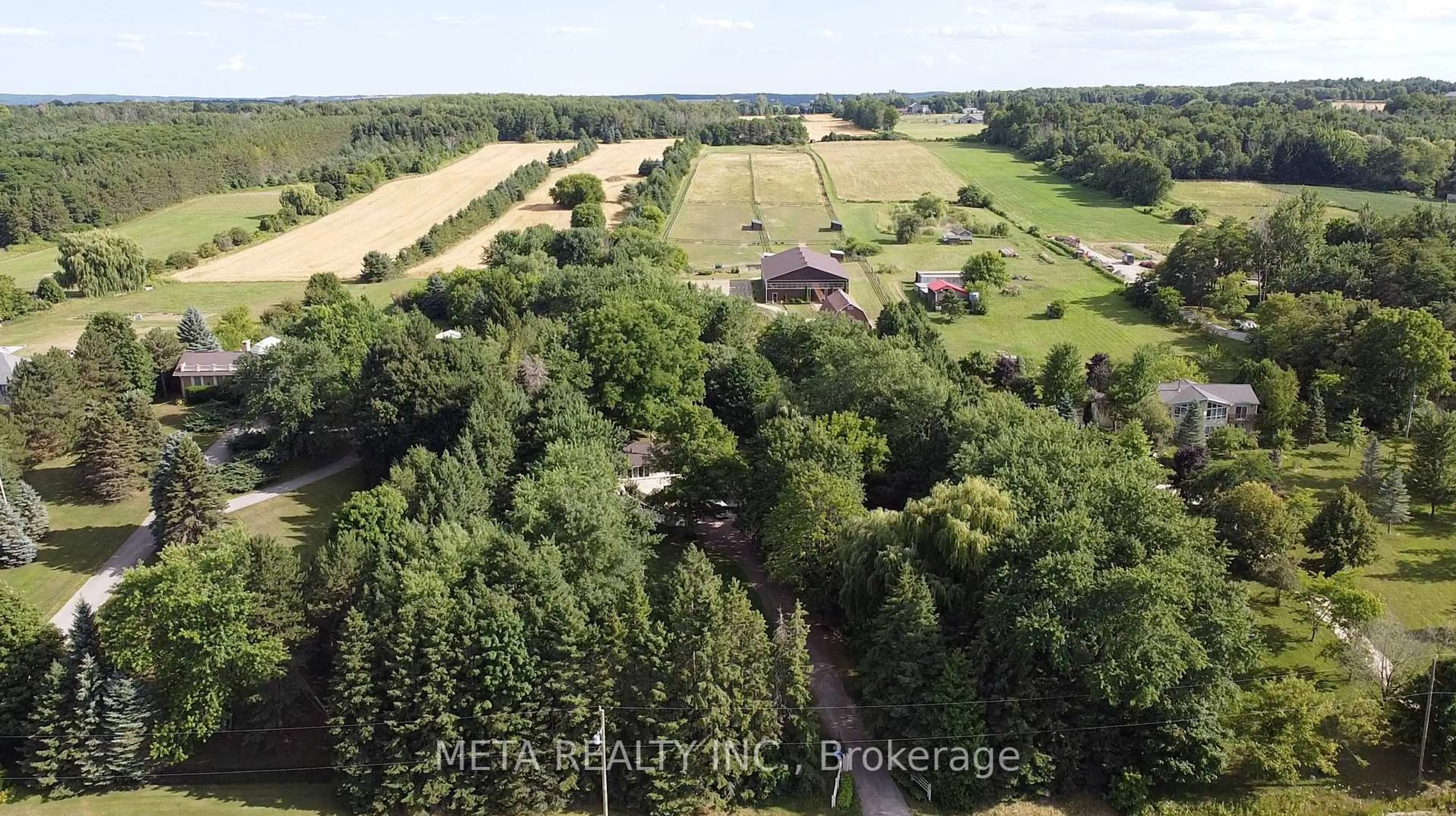 A pic from outside/outdoor area/front of a property/back of a property/a pic from drone, forest/trees view for 5653 Seventh Line, New Tecumseth Ontario L0G 1A0