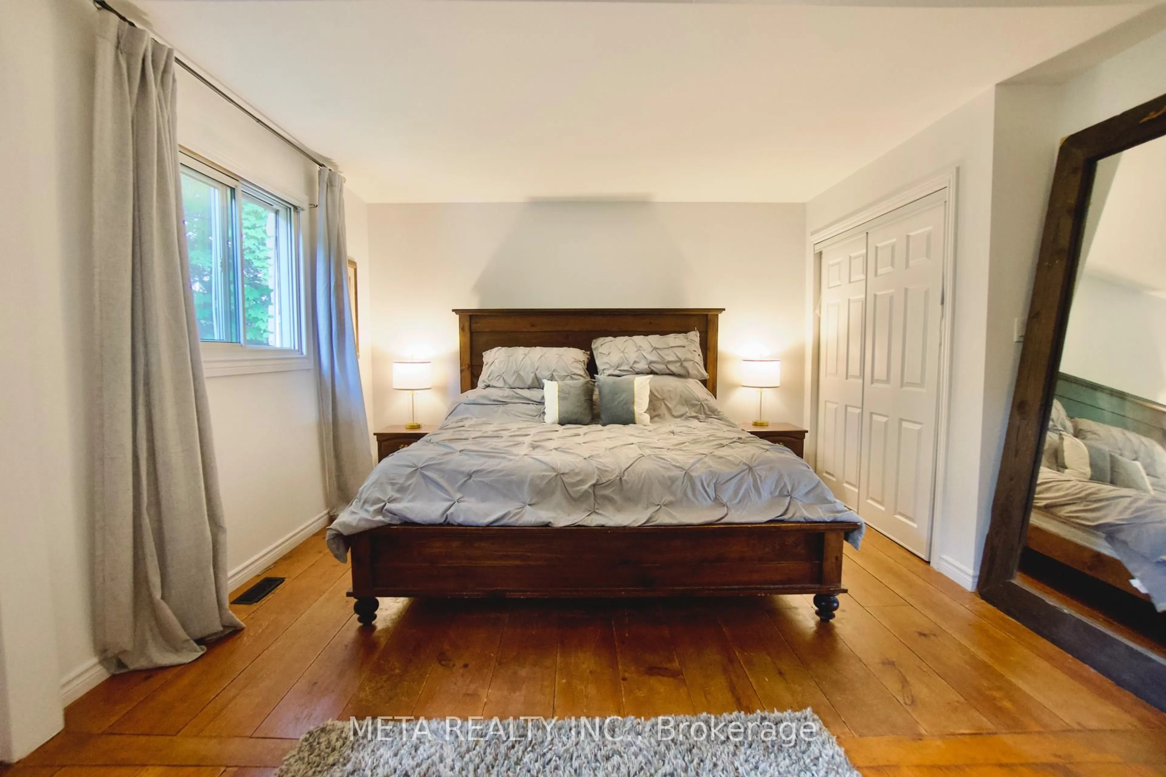 Bedroom with bed, wood/laminate floor for 5653 Seventh Line, New Tecumseth Ontario L0G 1A0