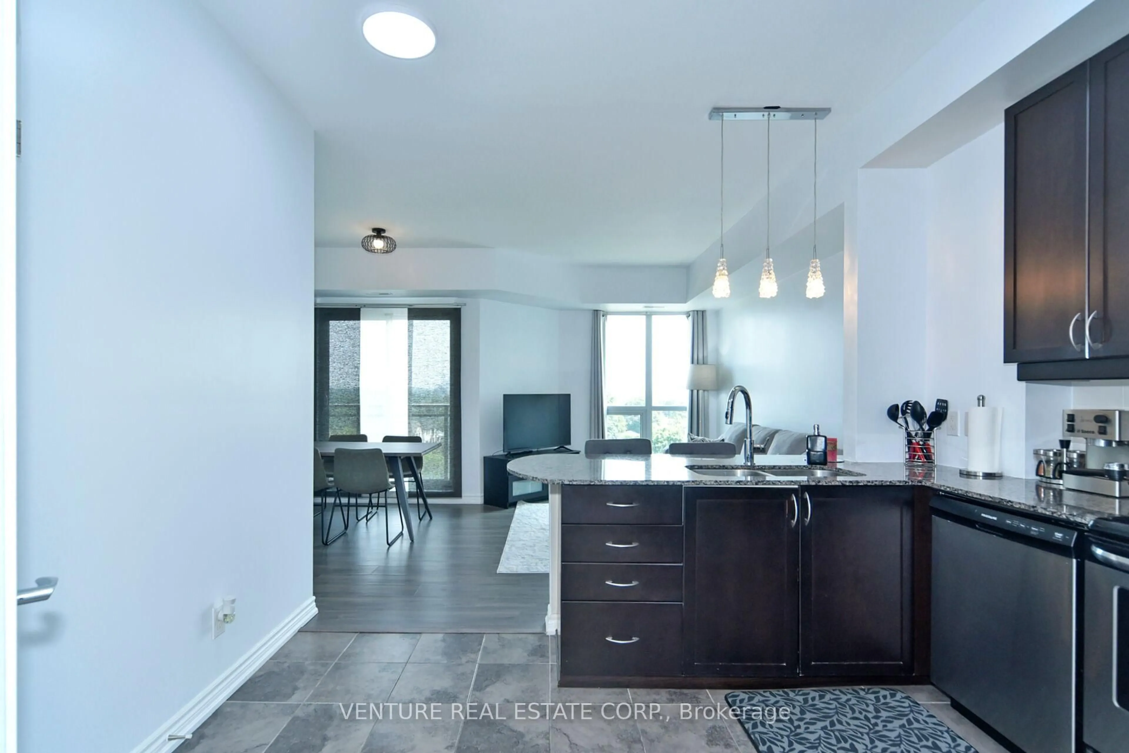 Open concept kitchen, ceramic/tile floor for 7730 Kipling Ave #707, Vaughan Ontario L4L 1Y9