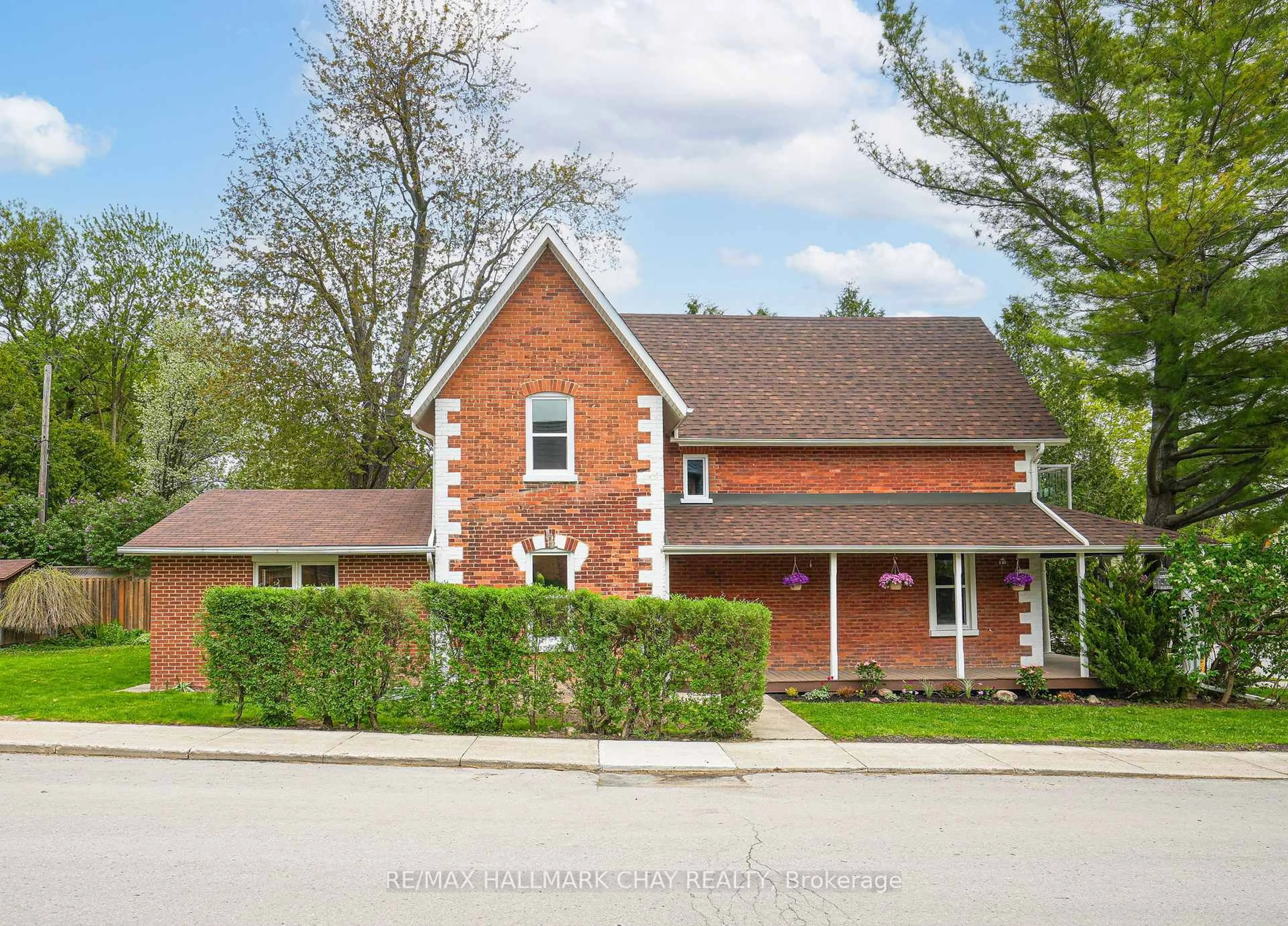 Home with brick exterior material, street for 14 Wilson St, New Tecumseth Ontario L0G 1W0