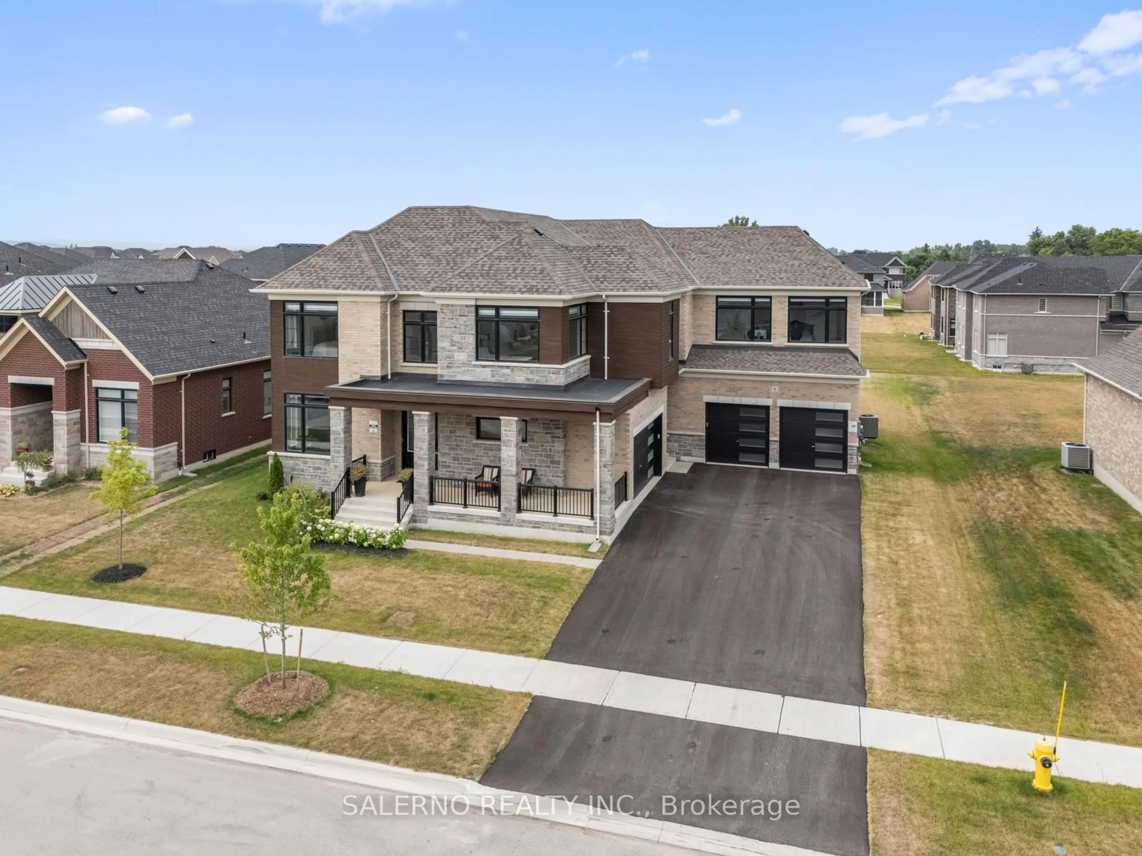 A pic from outside/outdoor area/front of a property/back of a property/a pic from drone, street for 6 Magnolia Ave, Adjala-Tosorontio Ontario L0G 1W0