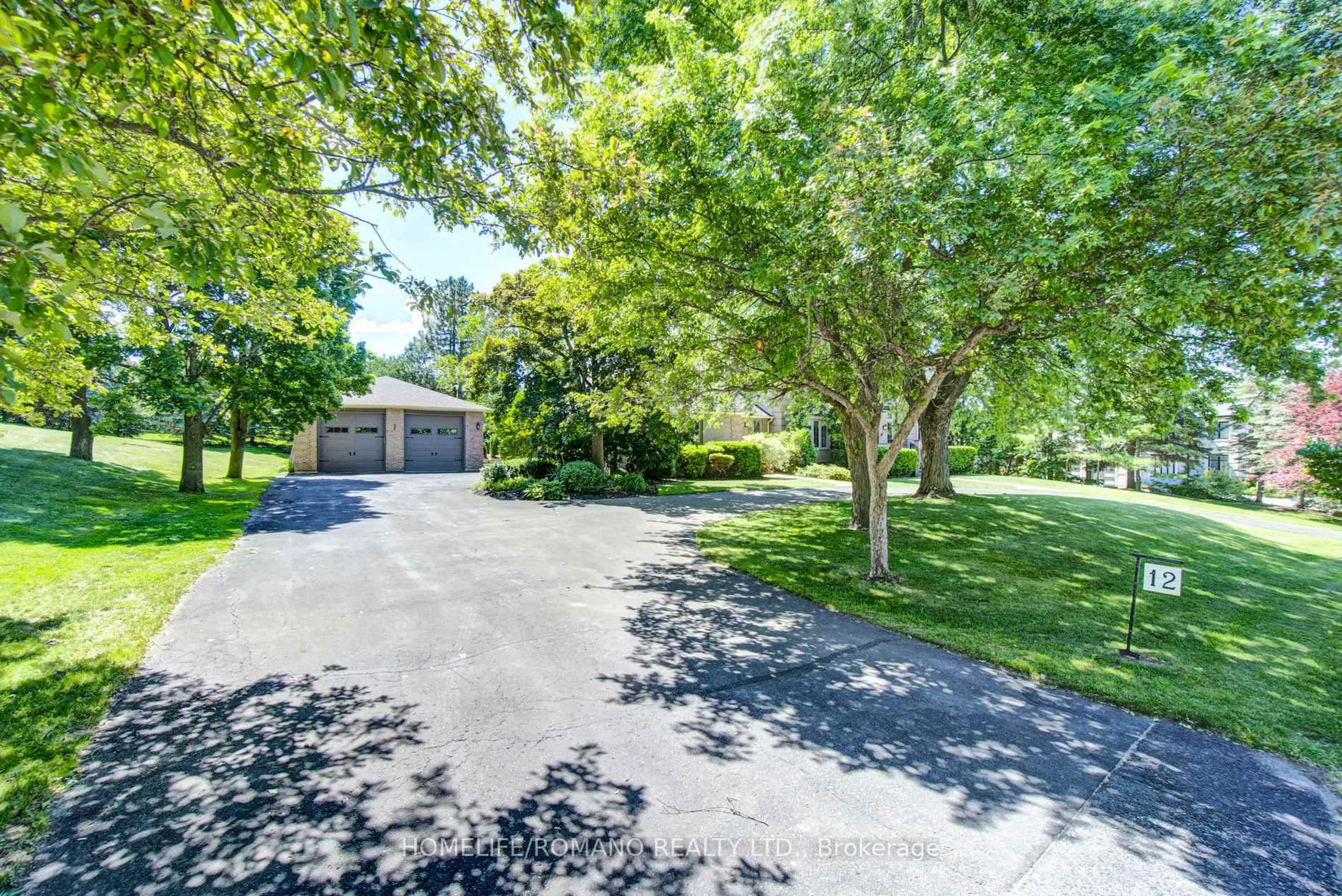 A pic from outside/outdoor area/front of a property/back of a property/a pic from drone, street for 12 Hedgerow Lane, Vaughan Ontario L0J 1C0