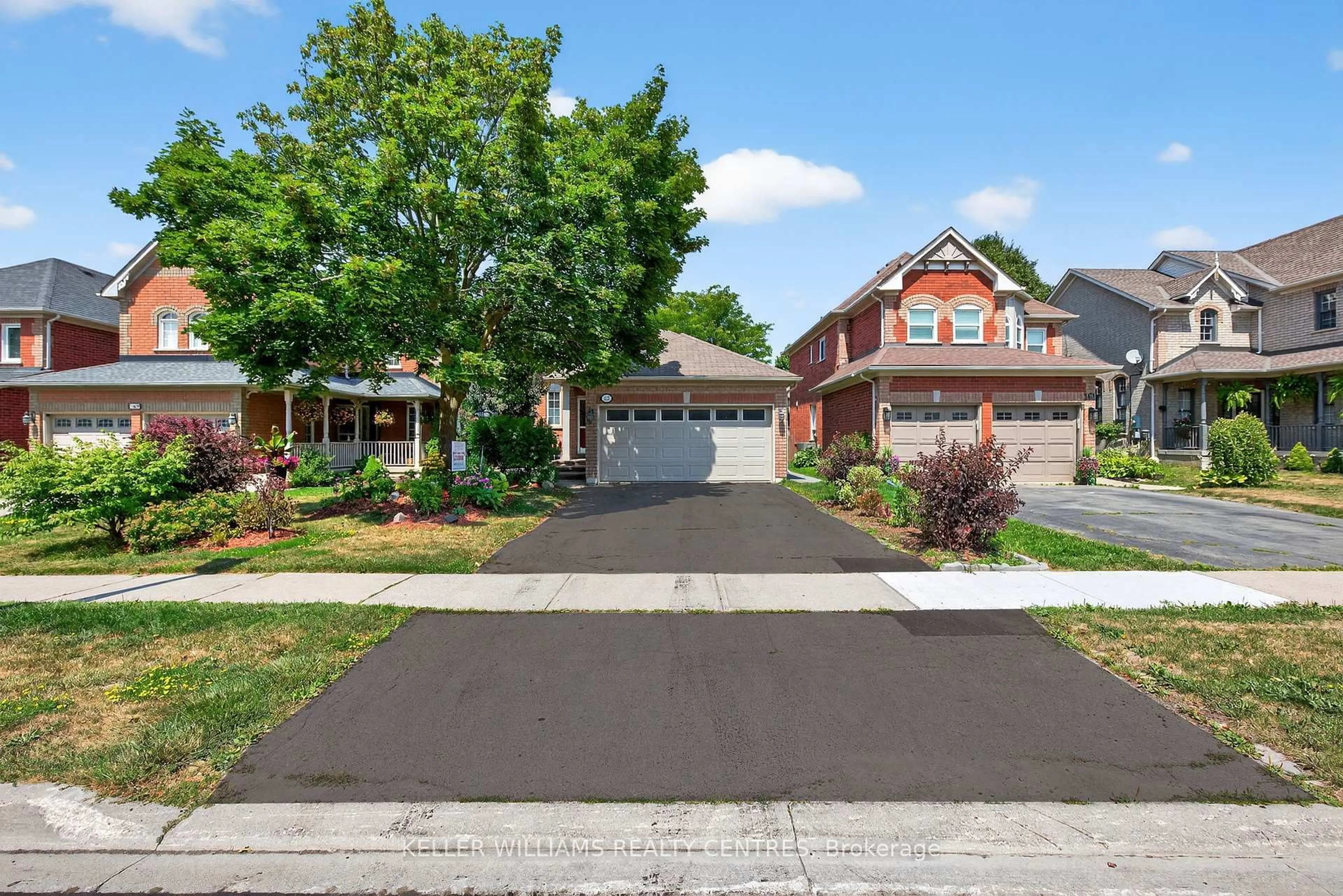 Home with brick exterior material, street for 165 Clearmeadow Blvd, Newmarket Ontario L3X 2E4