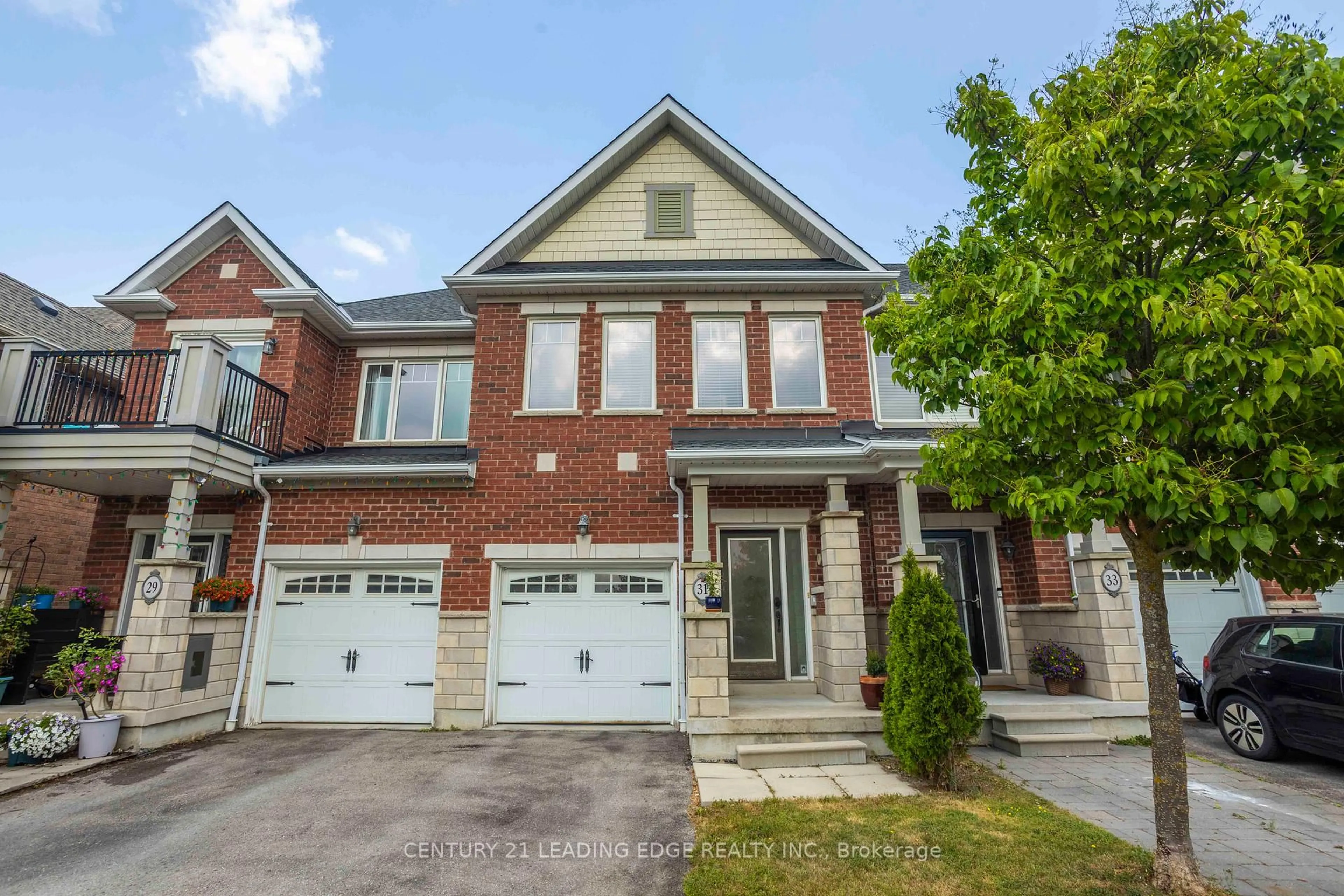 Home with brick exterior material, street for 31 NW Passage, Whitchurch-Stouffville Ontario L4A 0T2