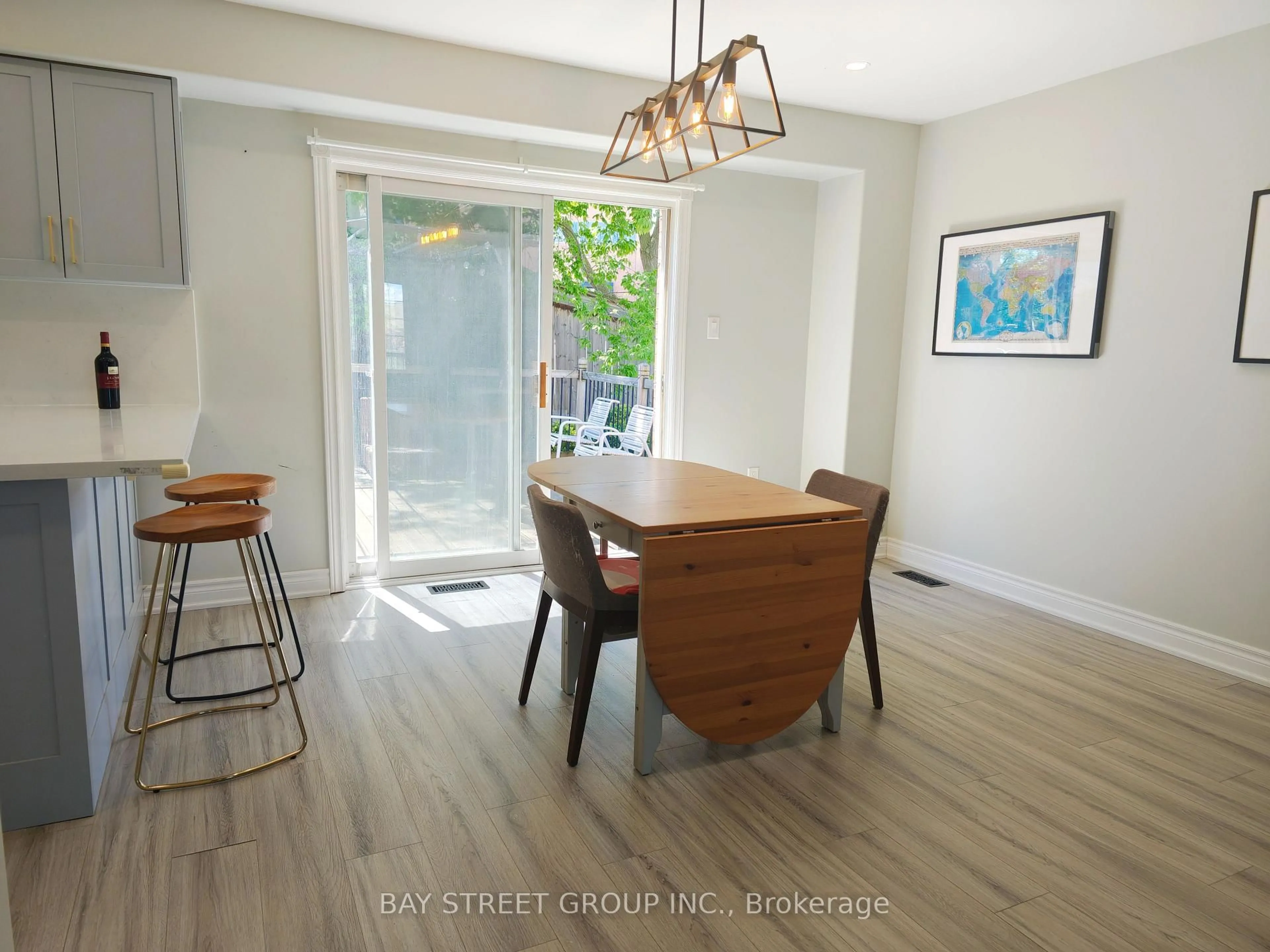 Dining room, wood/laminate floor for 18 Wrendale Cres, Georgina Ontario L4P 4C4