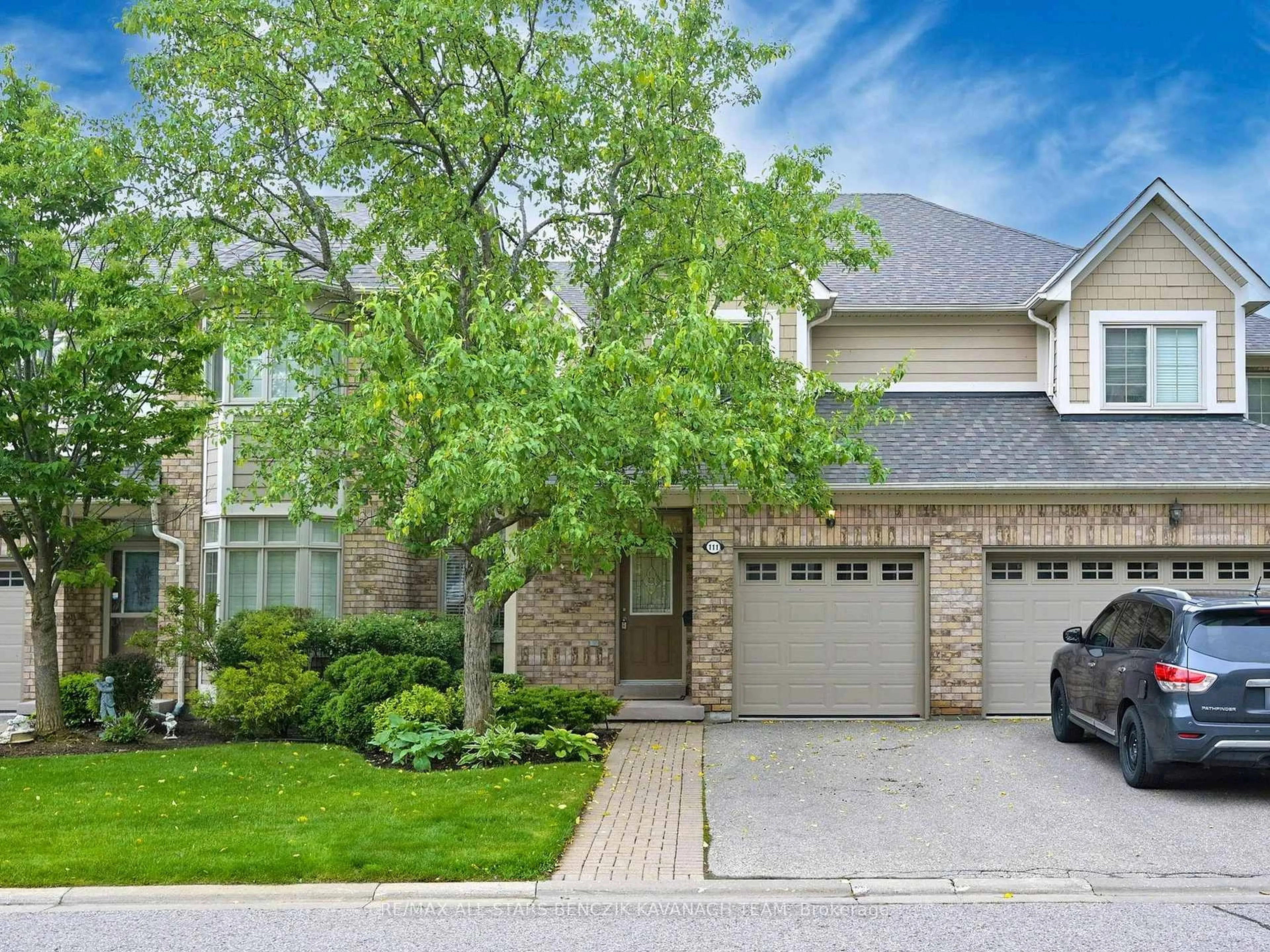 Home with brick exterior material, street for 111 Louisbourg Way, Markham Ontario L6E 2A2