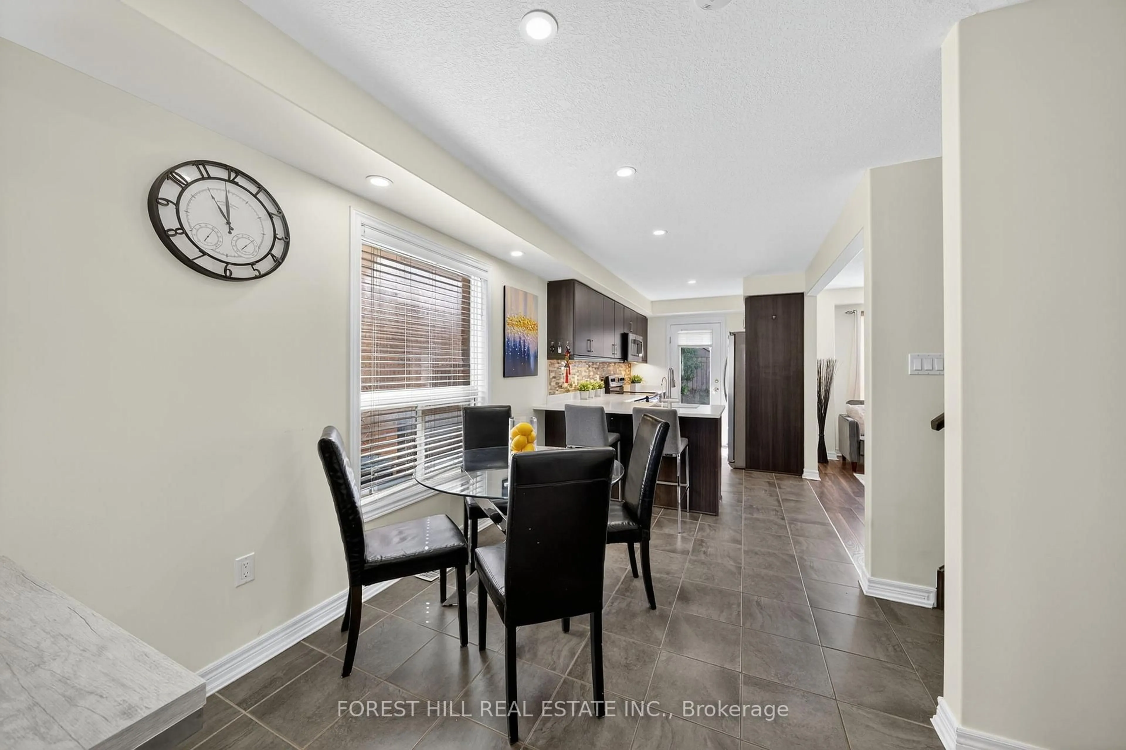 Open concept kitchen, ceramic/tile floor for 160 Banting Cres, Essa Ontario L0M 1B6