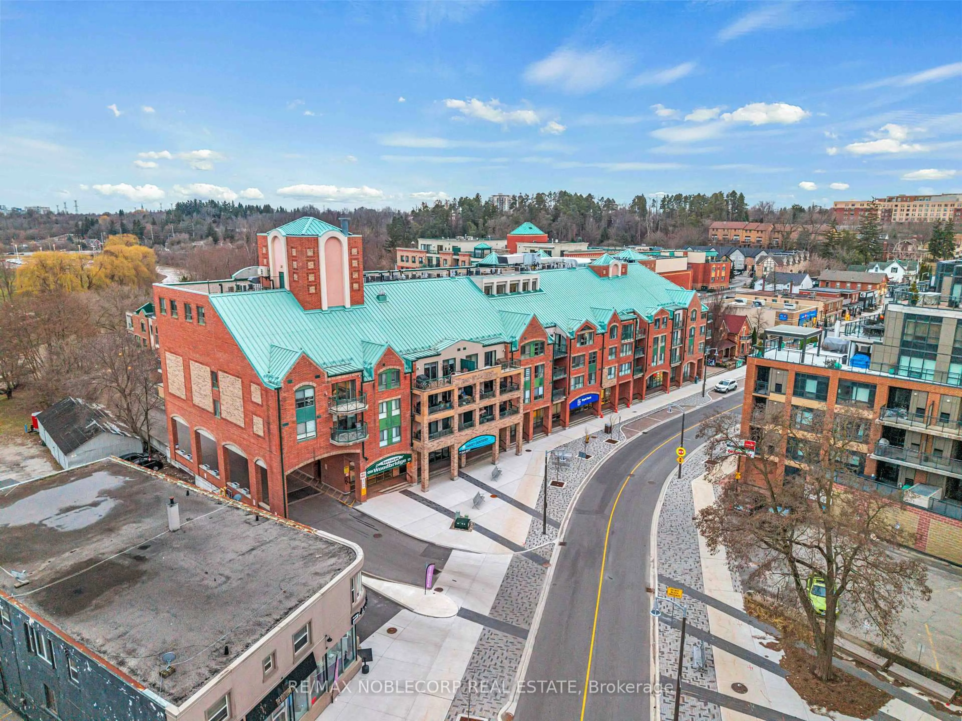 A pic from outside/outdoor area/front of a property/back of a property/a pic from drone, city buildings view from balcony for 121 Woodbridge Ave #319, Vaughan Ontario L4L 9E3