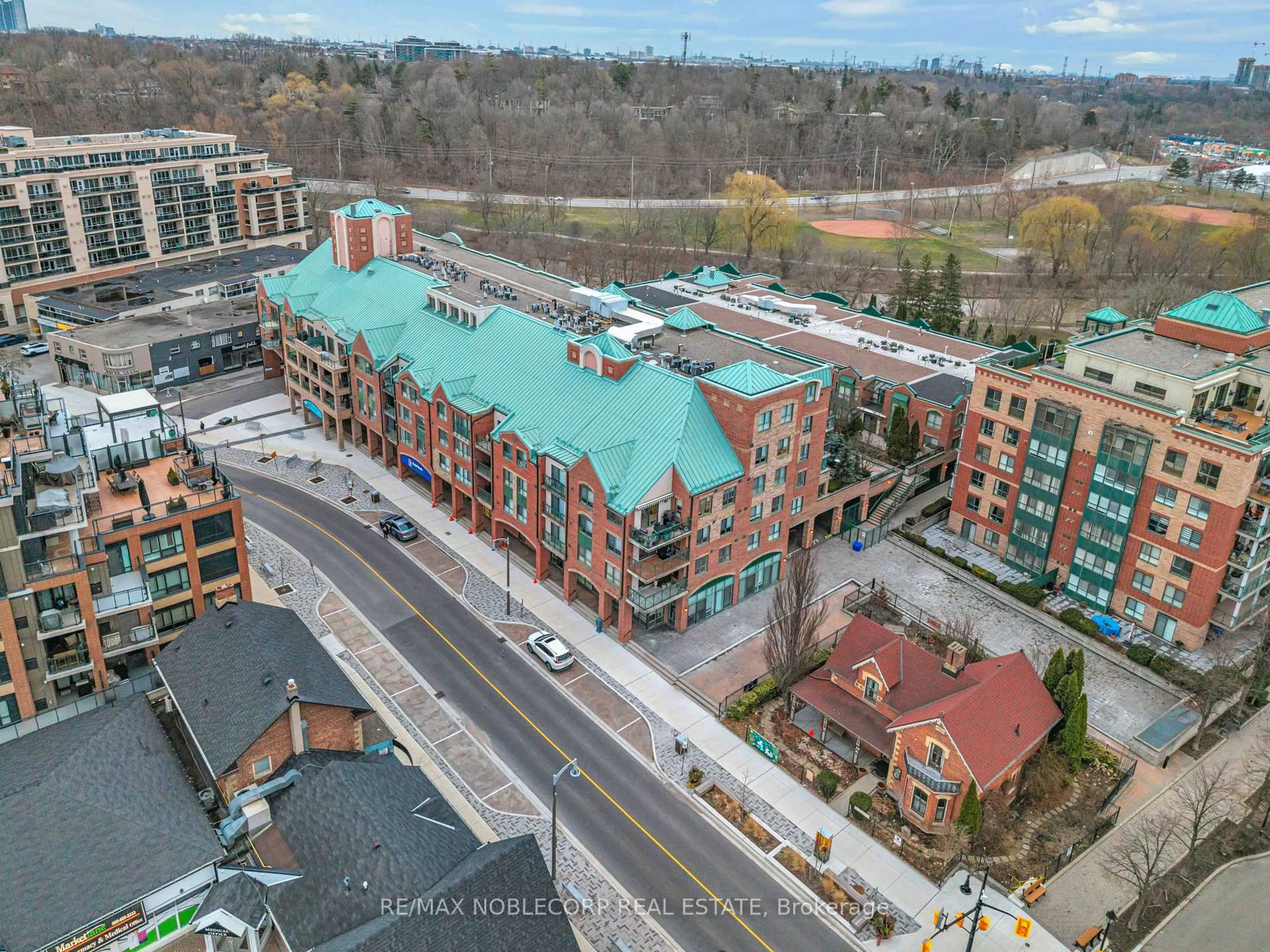 A pic from outside/outdoor area/front of a property/back of a property/a pic from drone, city buildings view from balcony for 121 Woodbridge Ave #319, Vaughan Ontario L4L 9E3