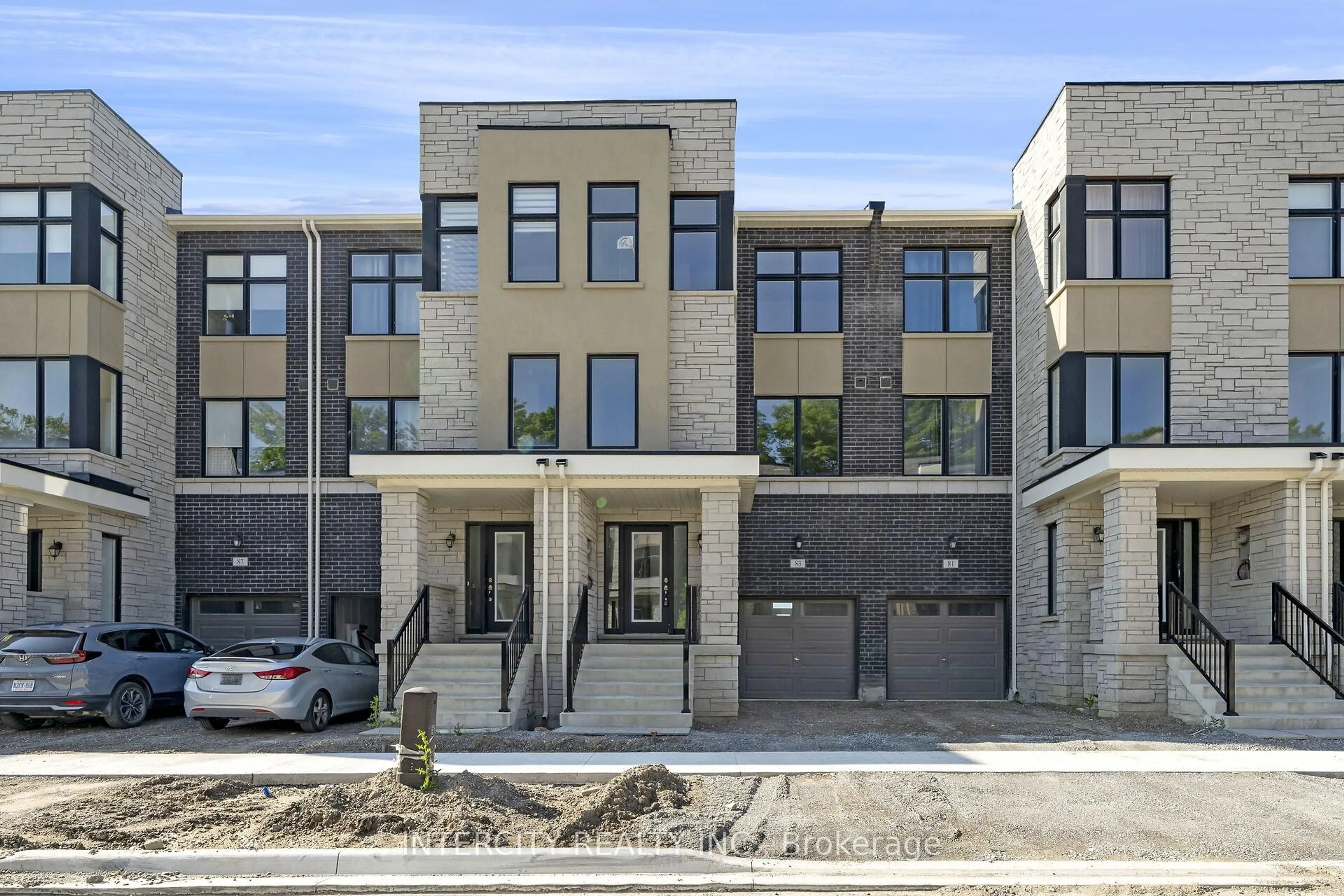 Home with brick exterior material, street for 83 Puisaya Dr, Richmond Hill Ontario L4E 1A2