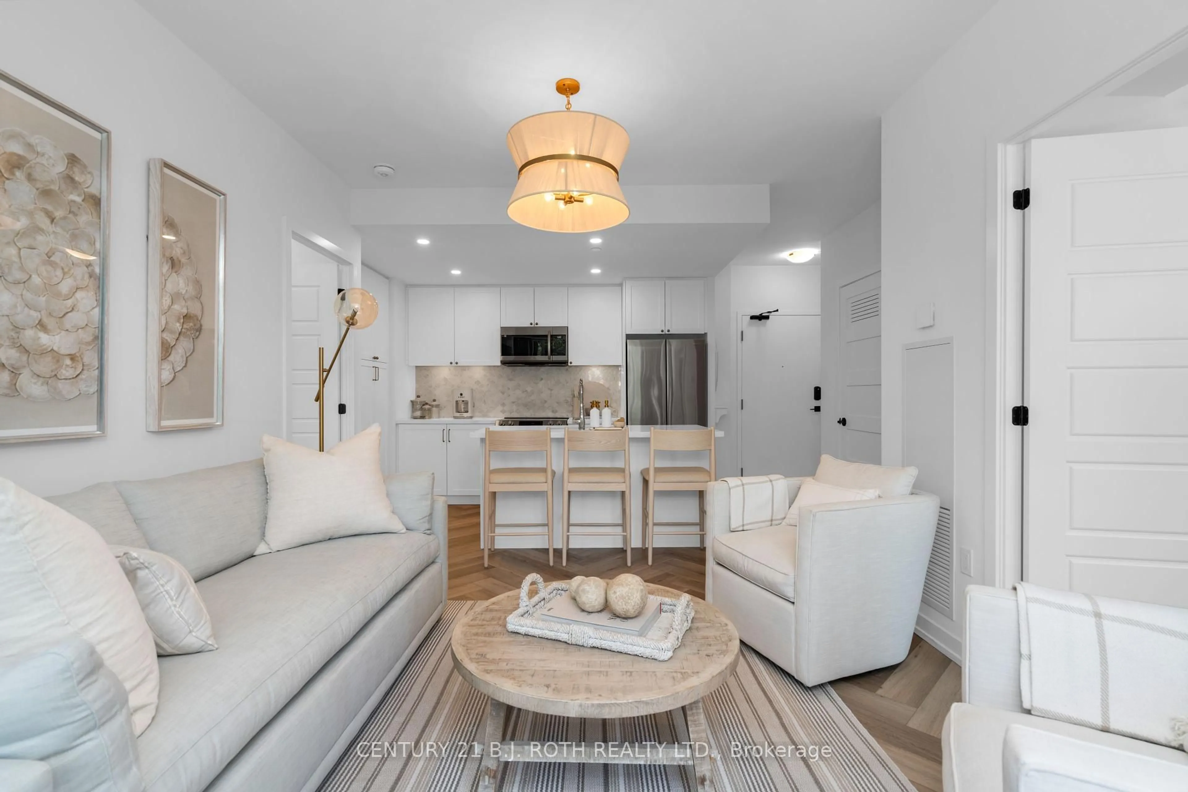 Living room with furniture, ceramic/tile floor for 415 Sea Ray Ave #247, Innisfil Ontario L9S 0R5