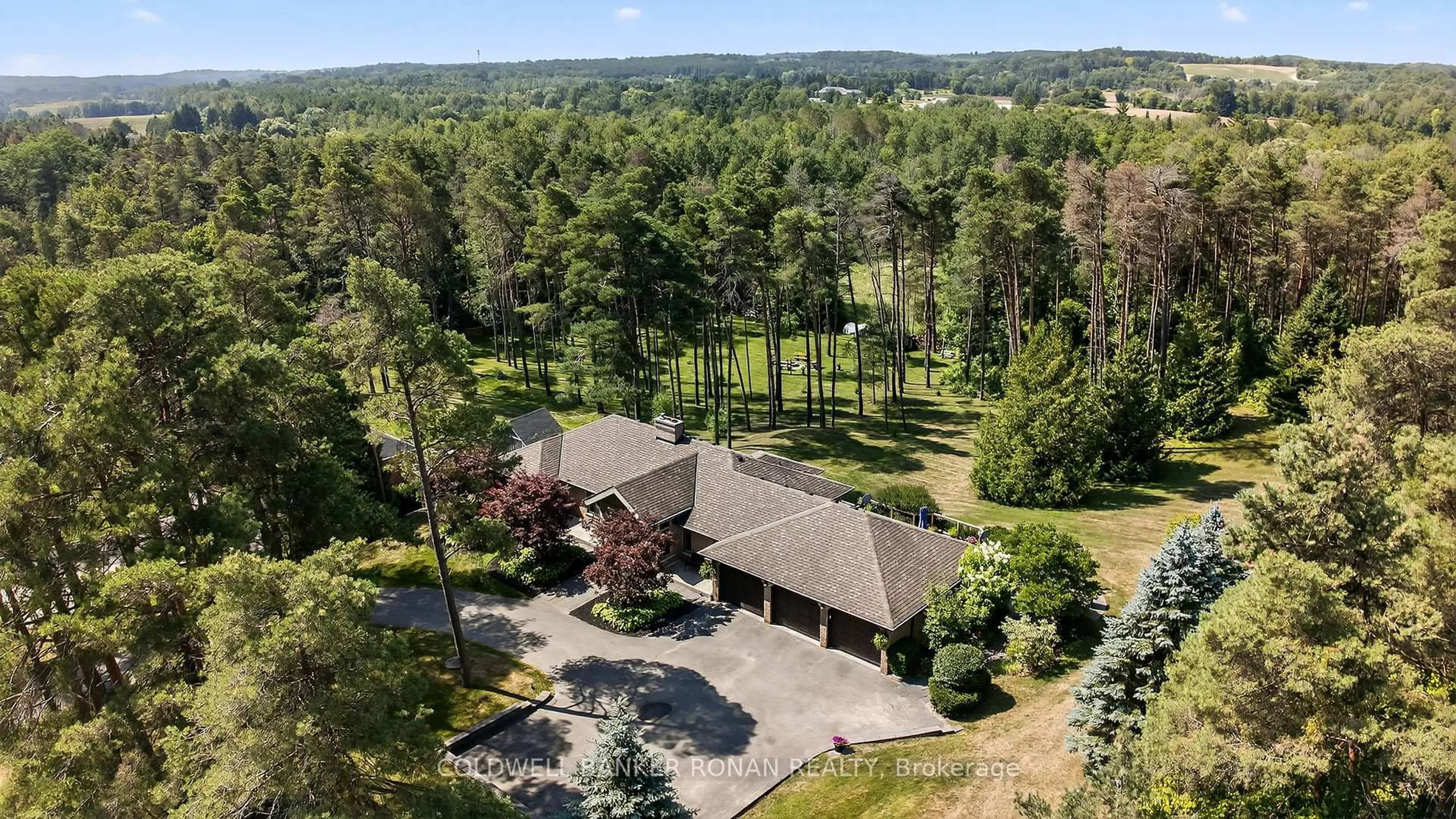A pic from outside/outdoor area/front of a property/back of a property/a pic from drone, forest/trees view for 6 Pyne Hills Crt, New Tecumseth Ontario L0G 1W0