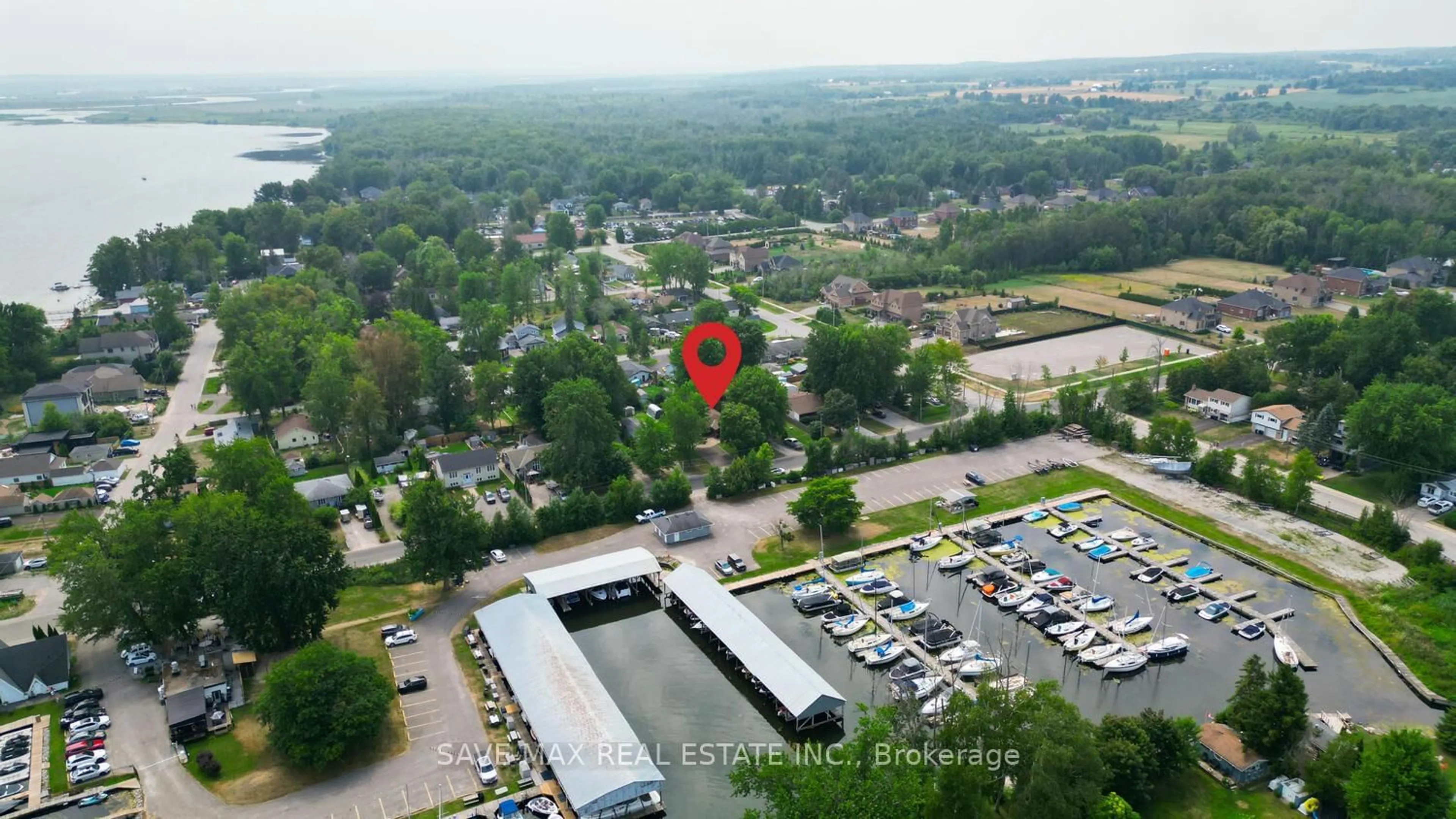 A pic from outside/outdoor area/front of a property/back of a property/a pic from drone, unknown for 1127 Shore Acres Dr, Innisfil Ontario L0L 1R0
