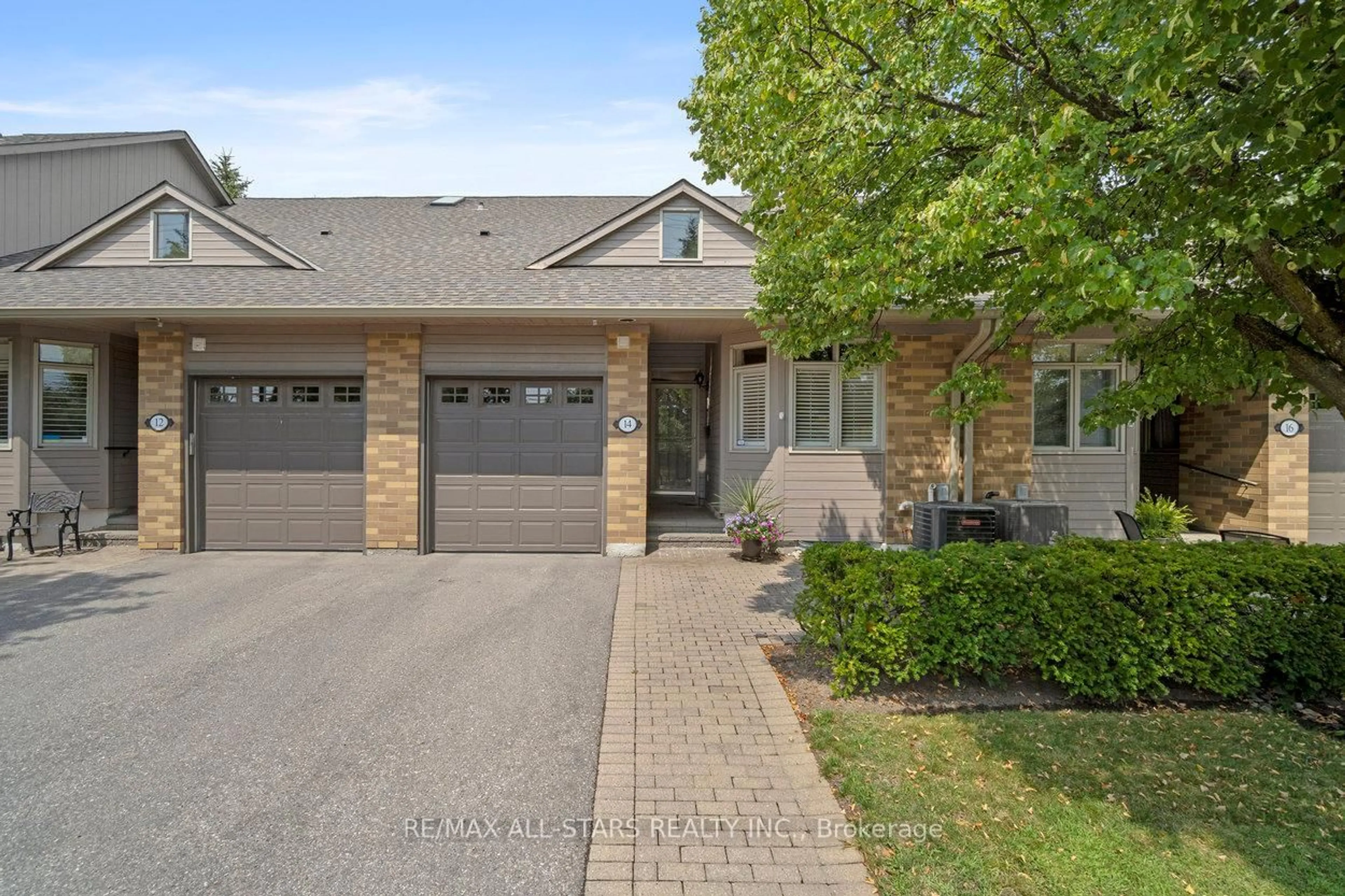 Home with brick exterior material, street for 14 Kingfisher Cove Way, Markham Ontario L6E 1B4