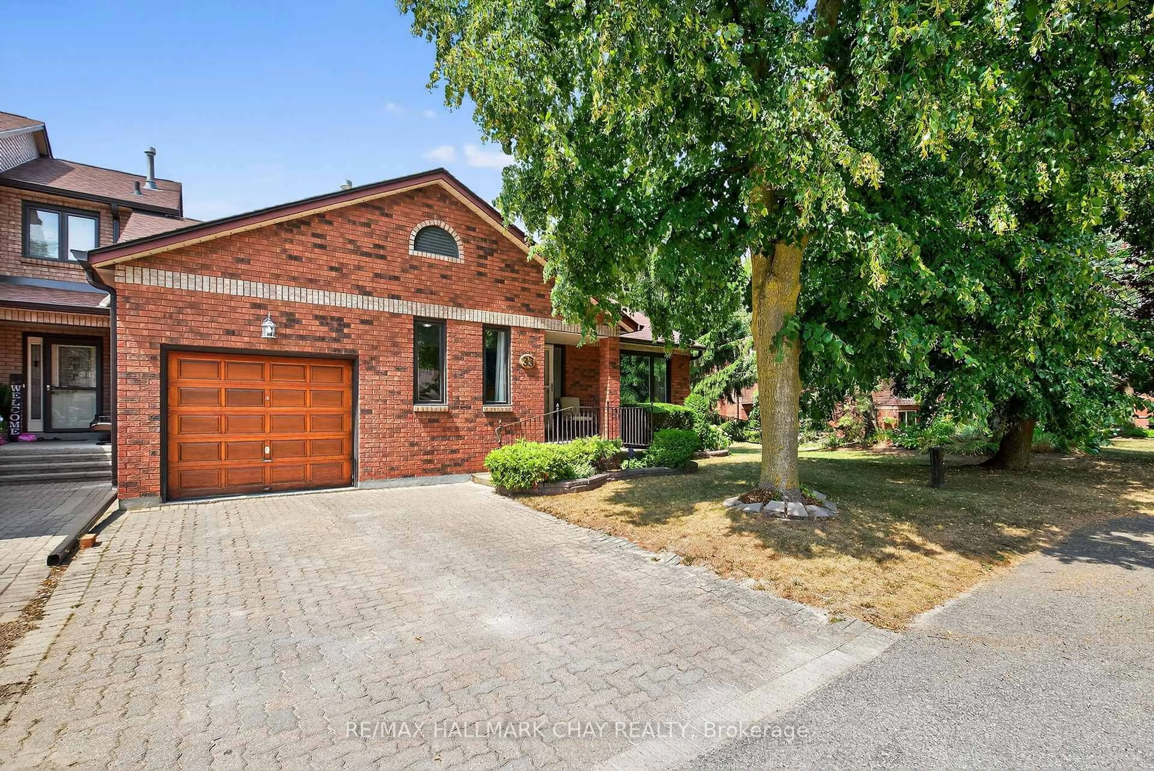 Home with brick exterior material, street for 33 Parkette Dr, New Tecumseth Ontario L9R 1R7