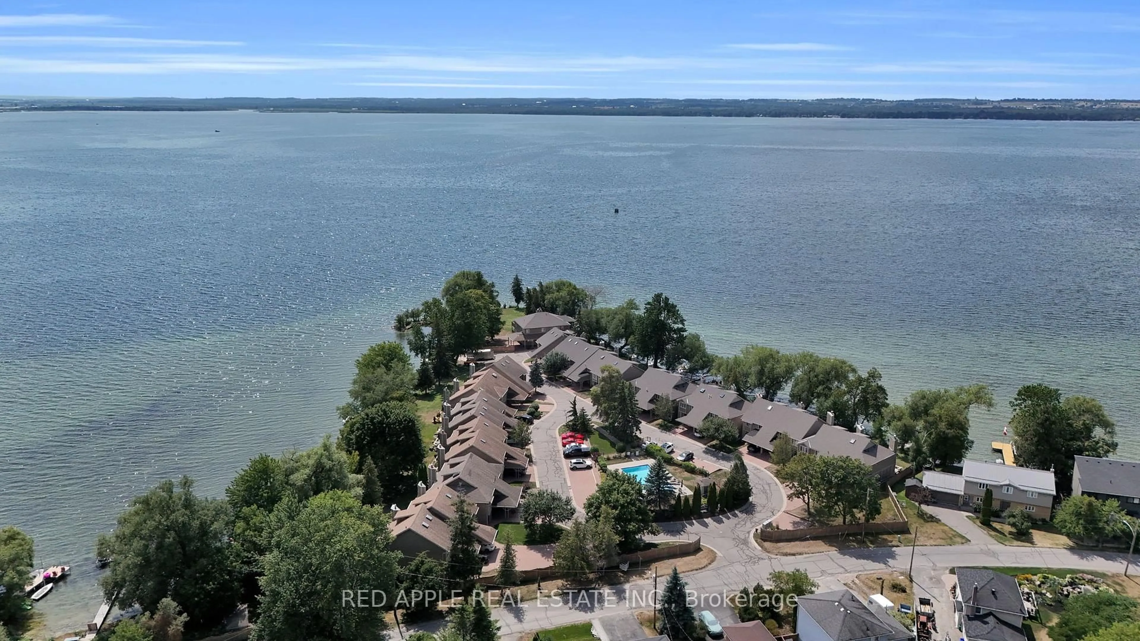 A pic from outside/outdoor area/front of a property/back of a property/a pic from drone, water/lake/river/ocean view for 12 Davy Point Circ, Georgina Ontario L4P 3H2