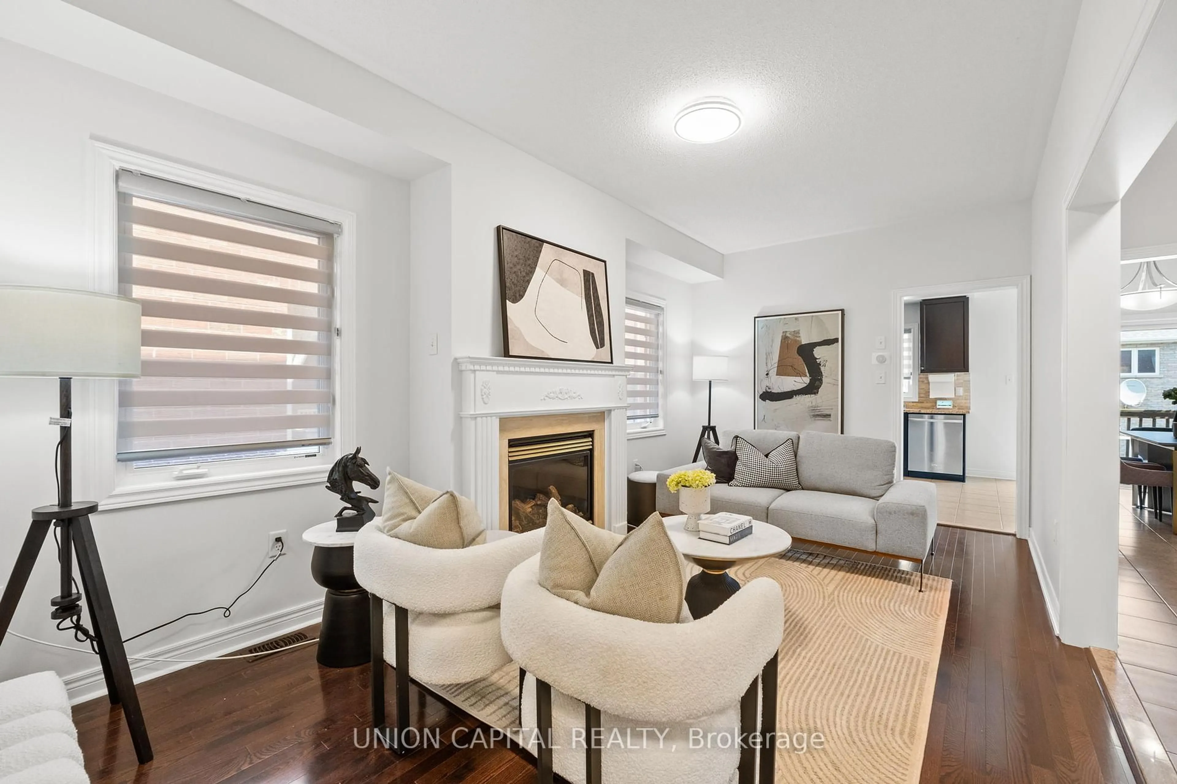 Living room with furniture, wood/laminate floor for 9 Landwood Ave, Vaughan Ontario L4J 0B9