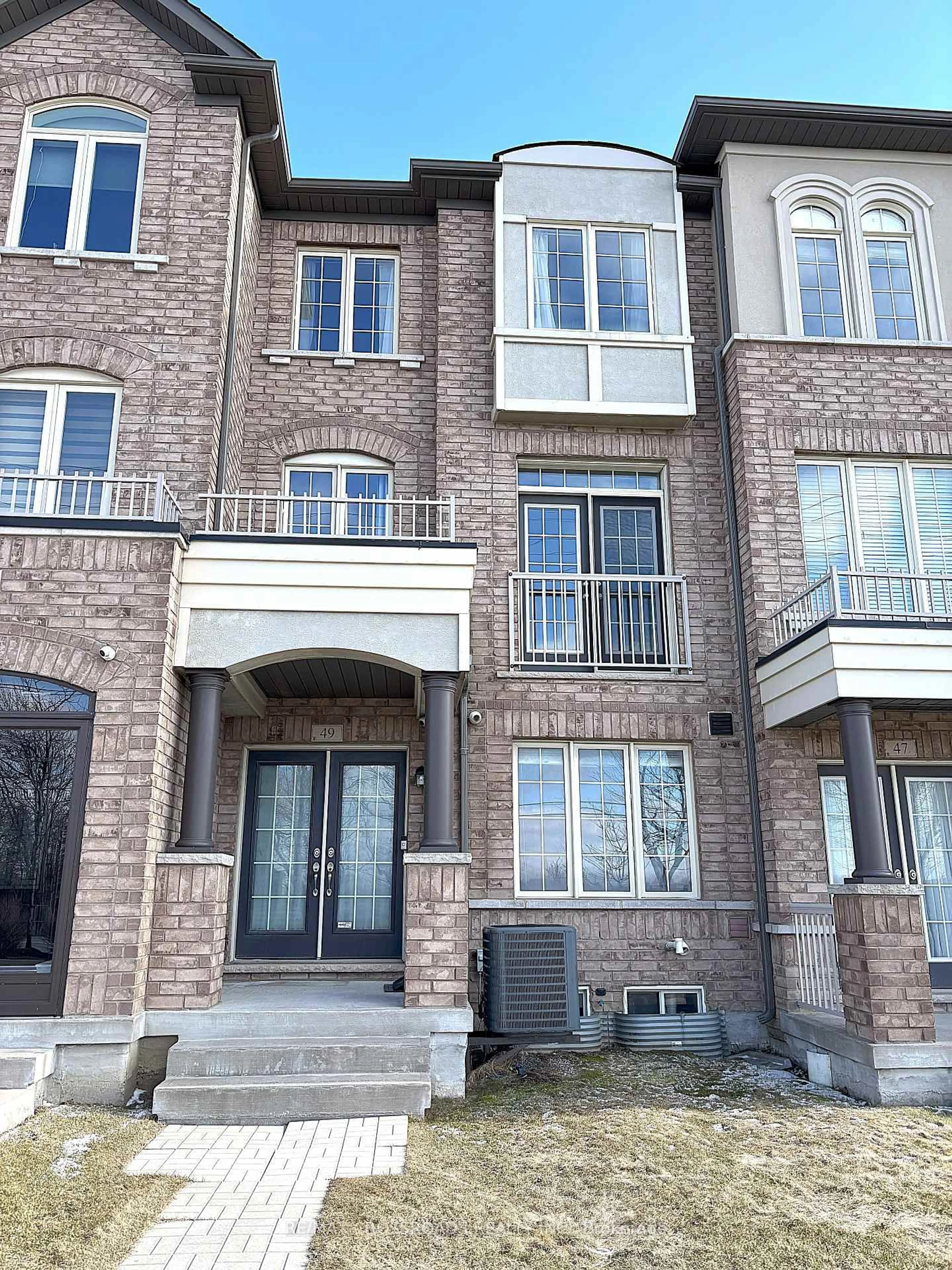 Home with brick exterior material, street for 49 Memon Pl, Markham Ontario L6E 0S1