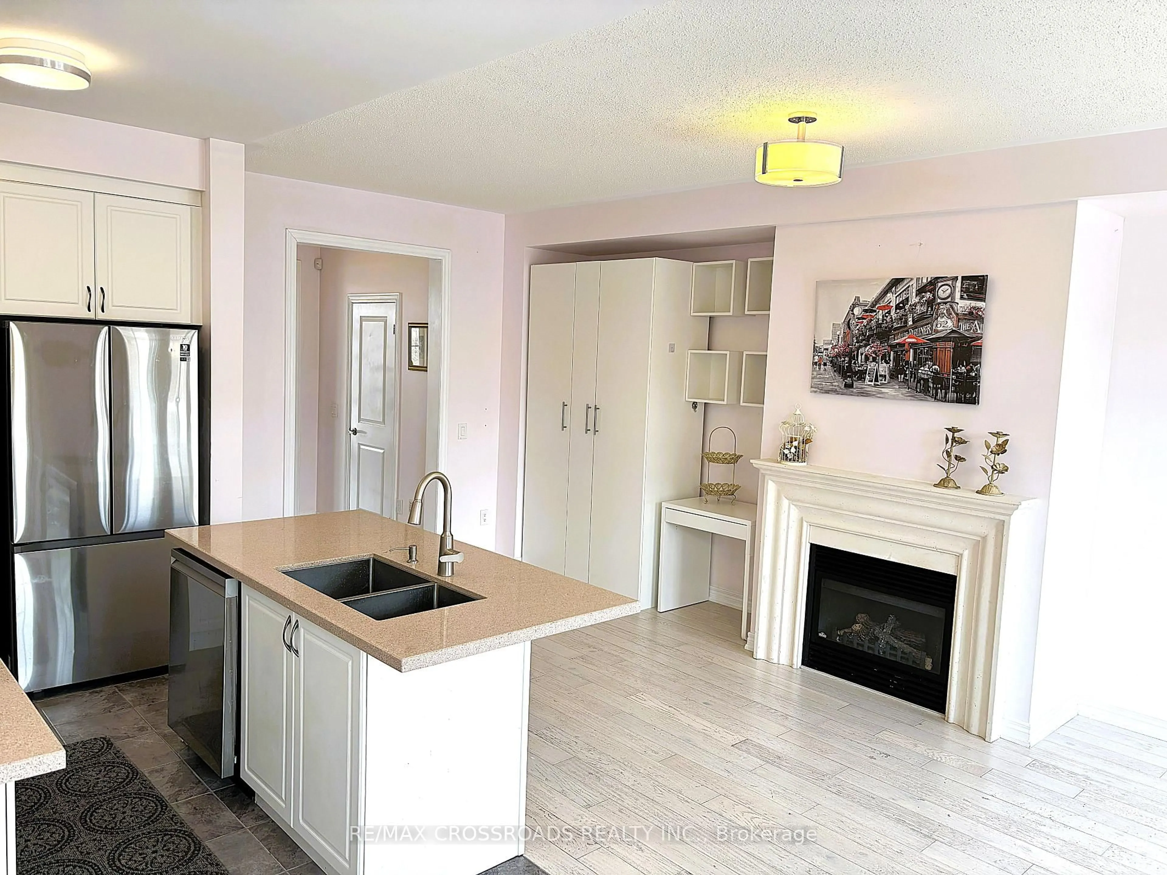 Open concept kitchen, wood/laminate floor for 49 Memon Pl, Markham Ontario L6E 0S1