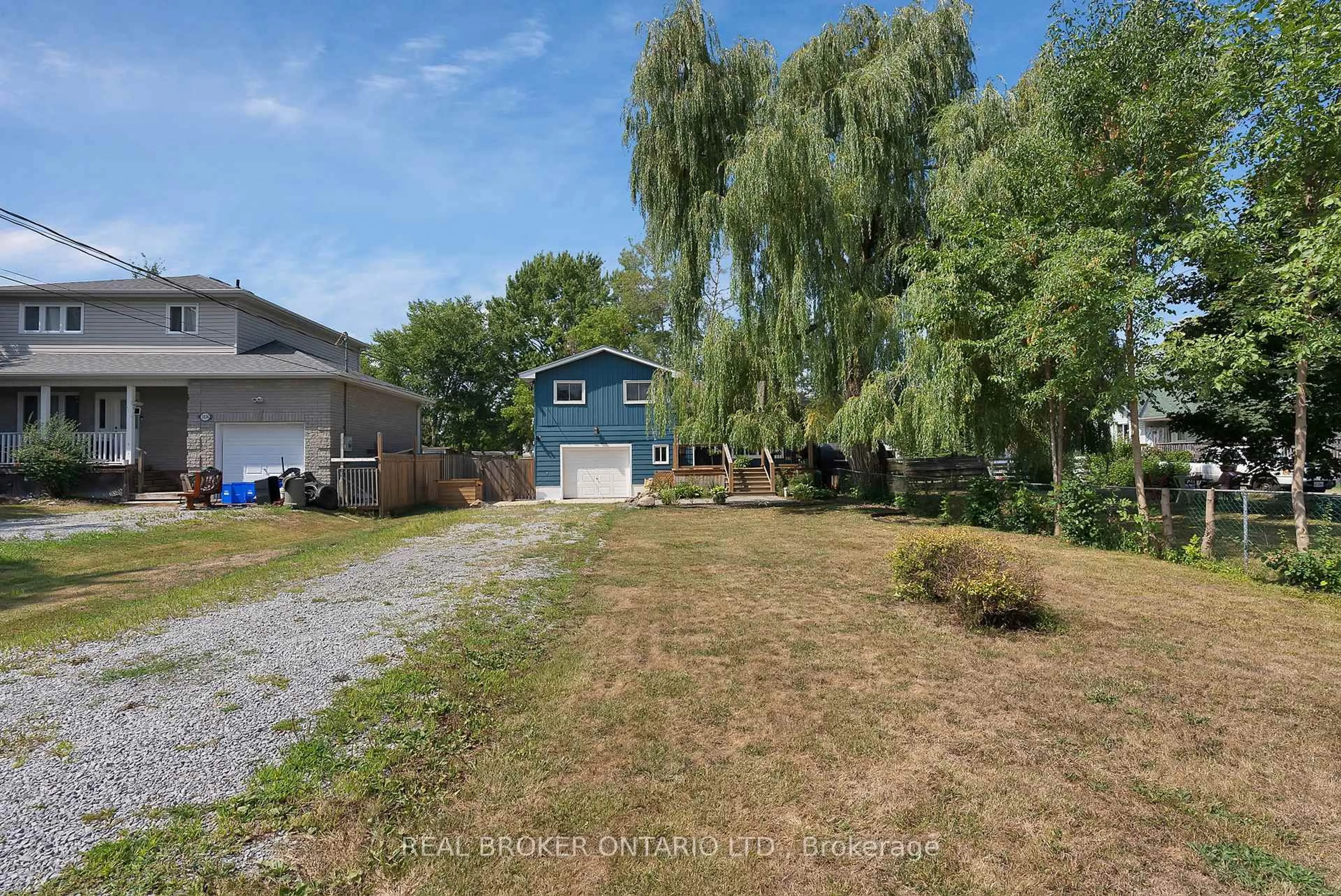 A pic from outside/outdoor area/front of a property/back of a property/a pic from drone, water/lake/river/ocean view for 1036 Metro Rd, Georgina Ontario L4P 3E9