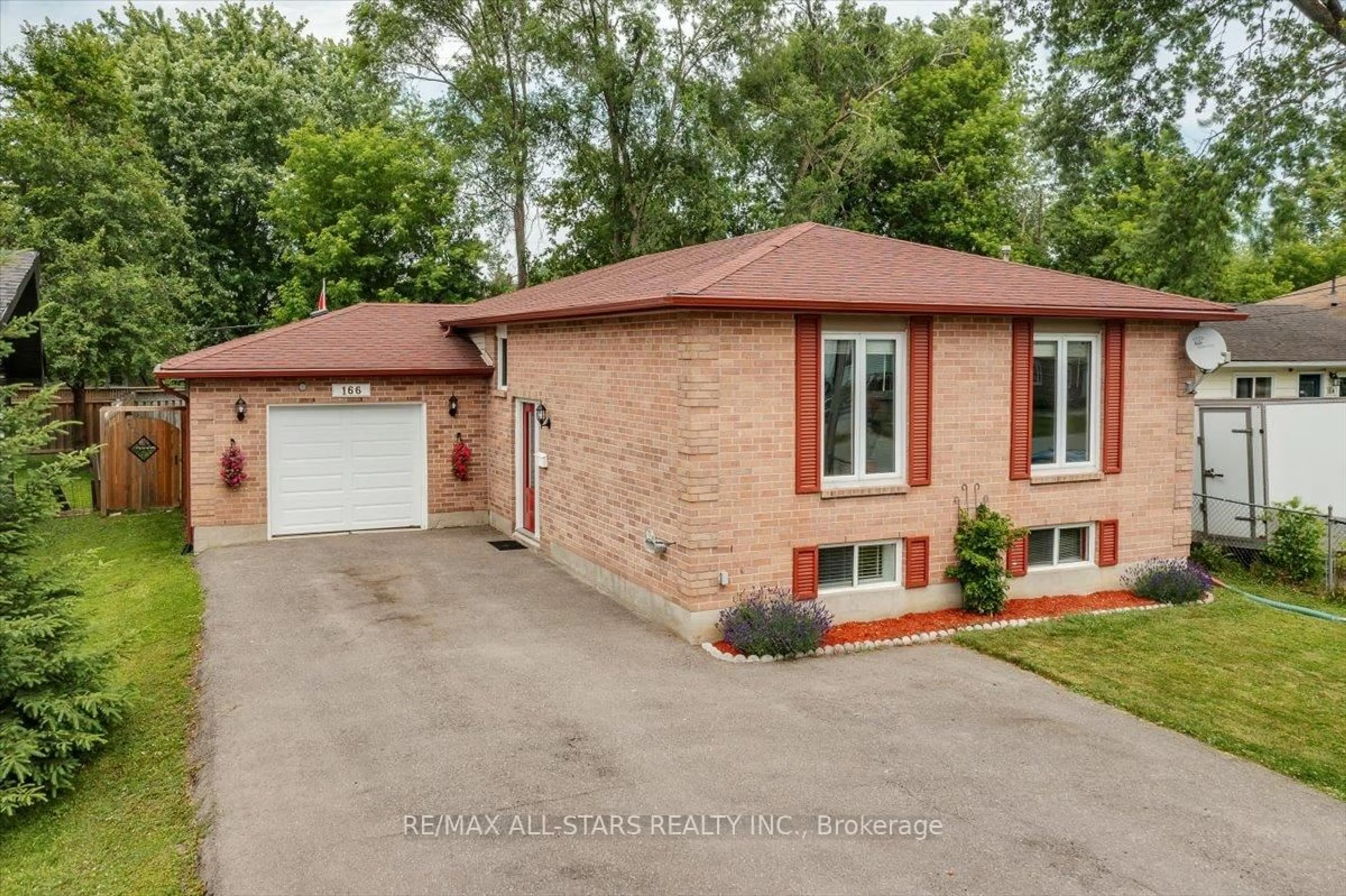 Home with brick exterior material, street for 166 Silas Blvd, Georgina Ontario L4P 2K3