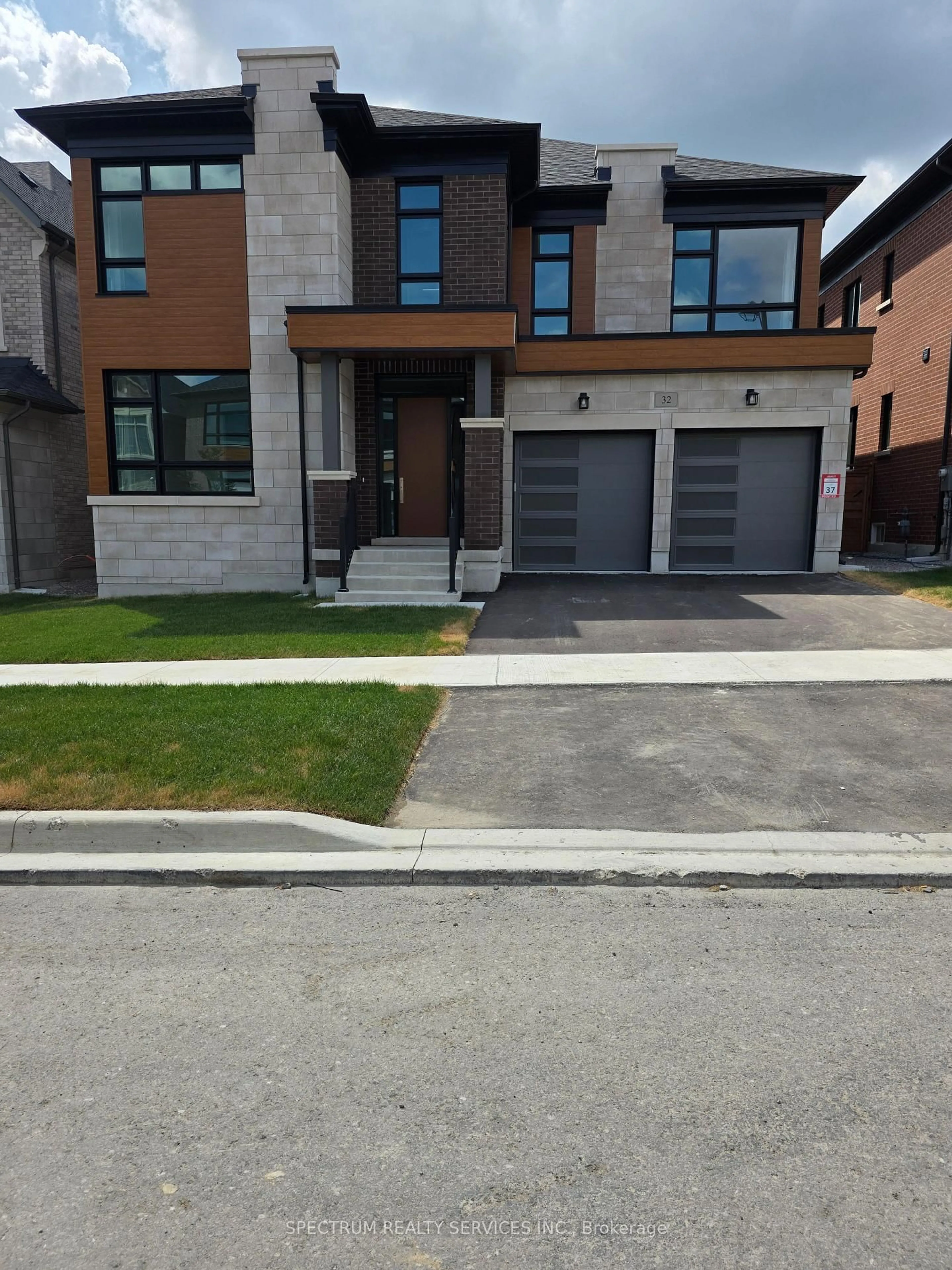 Home with brick exterior material, street for 32 Seraville St, Vaughan Ontario L3L 0H1