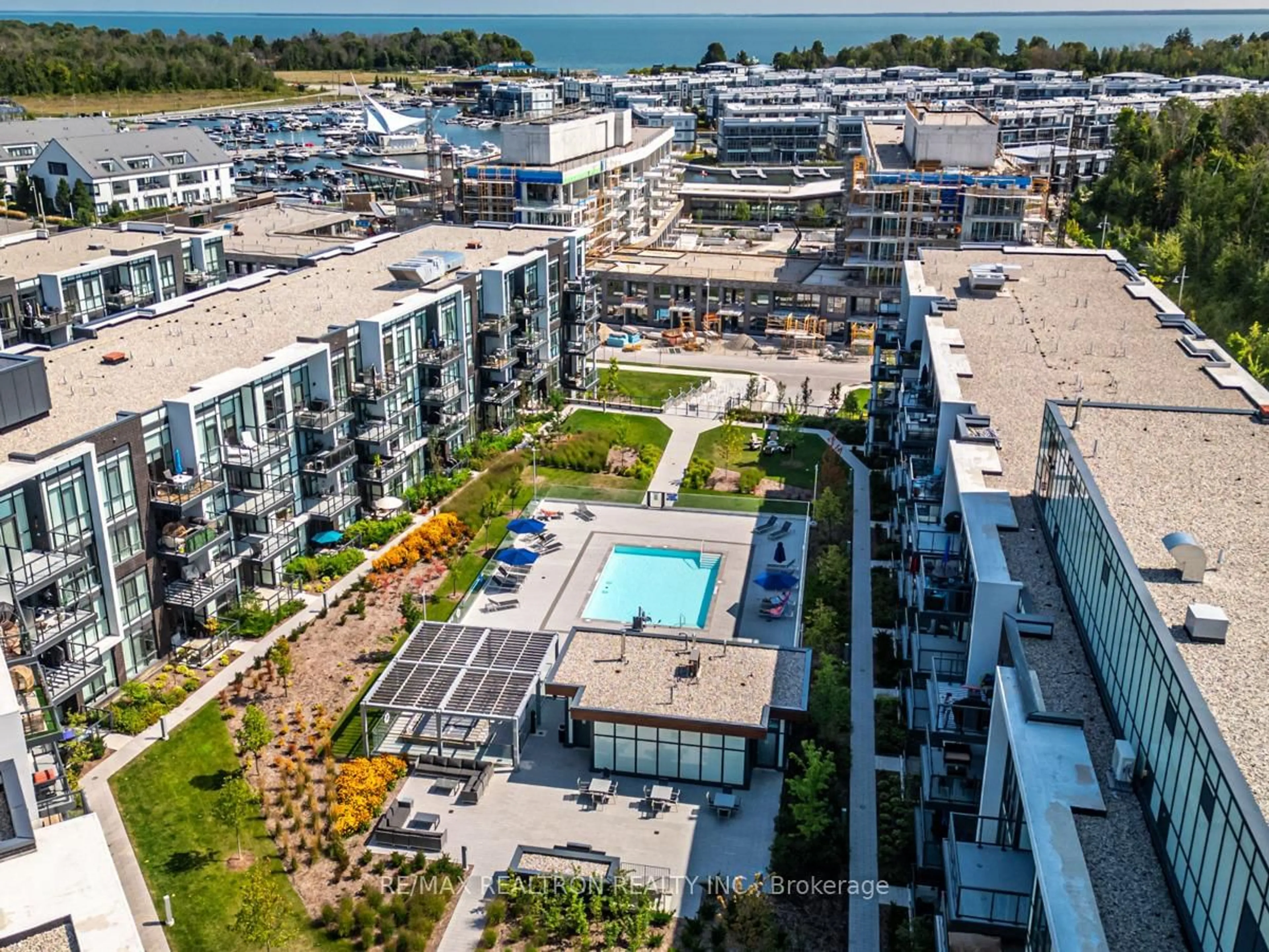 A pic from outside/outdoor area/front of a property/back of a property/a pic from drone, city buildings view from balcony for 415 Sea Ray Ave #345, Innisfil Ontario L9S 0R5