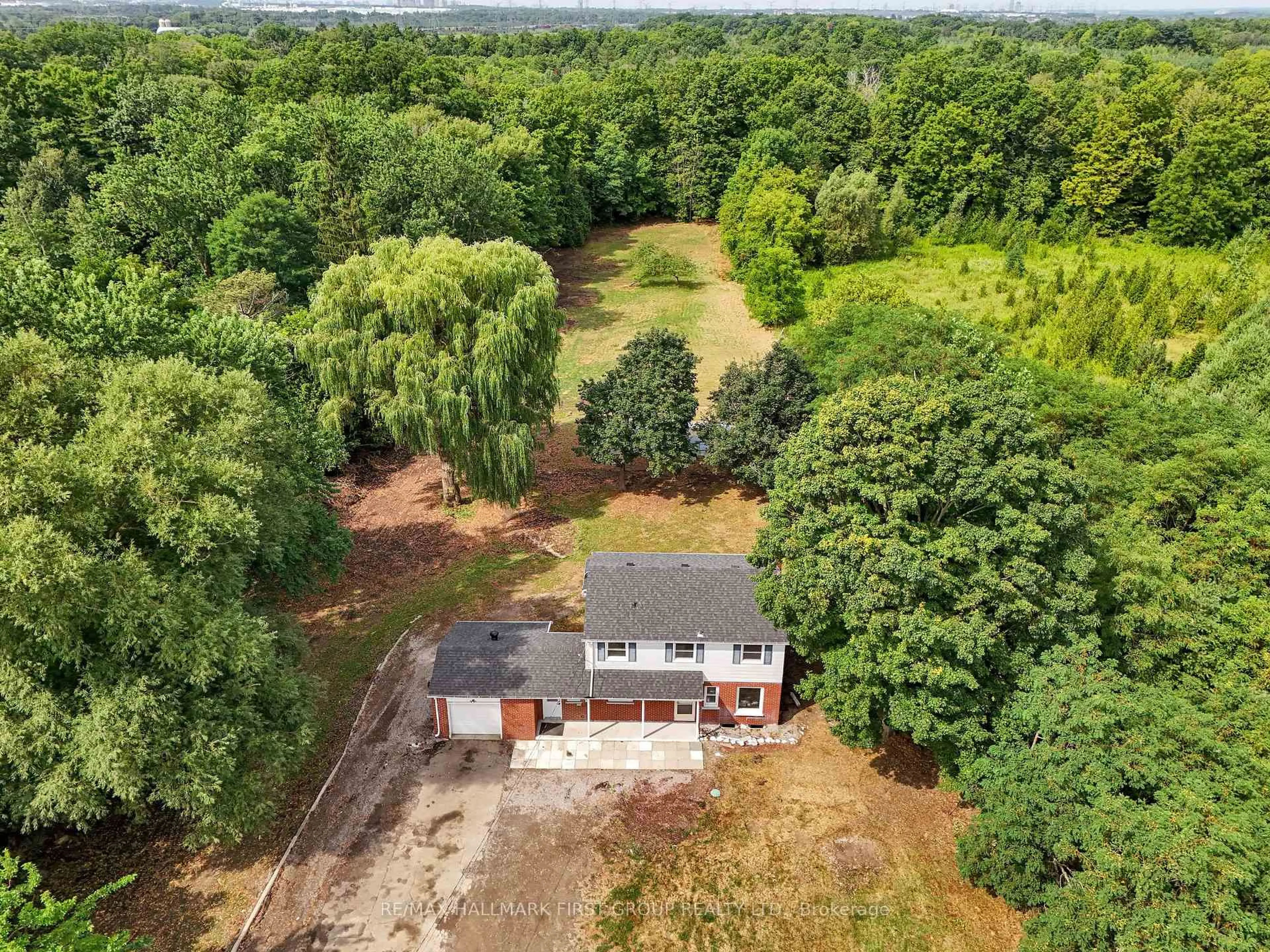 A pic from outside/outdoor area/front of a property/back of a property/a pic from drone, forest/trees view for 7300 Reesor Rd, Markham Ontario L6B 1A8