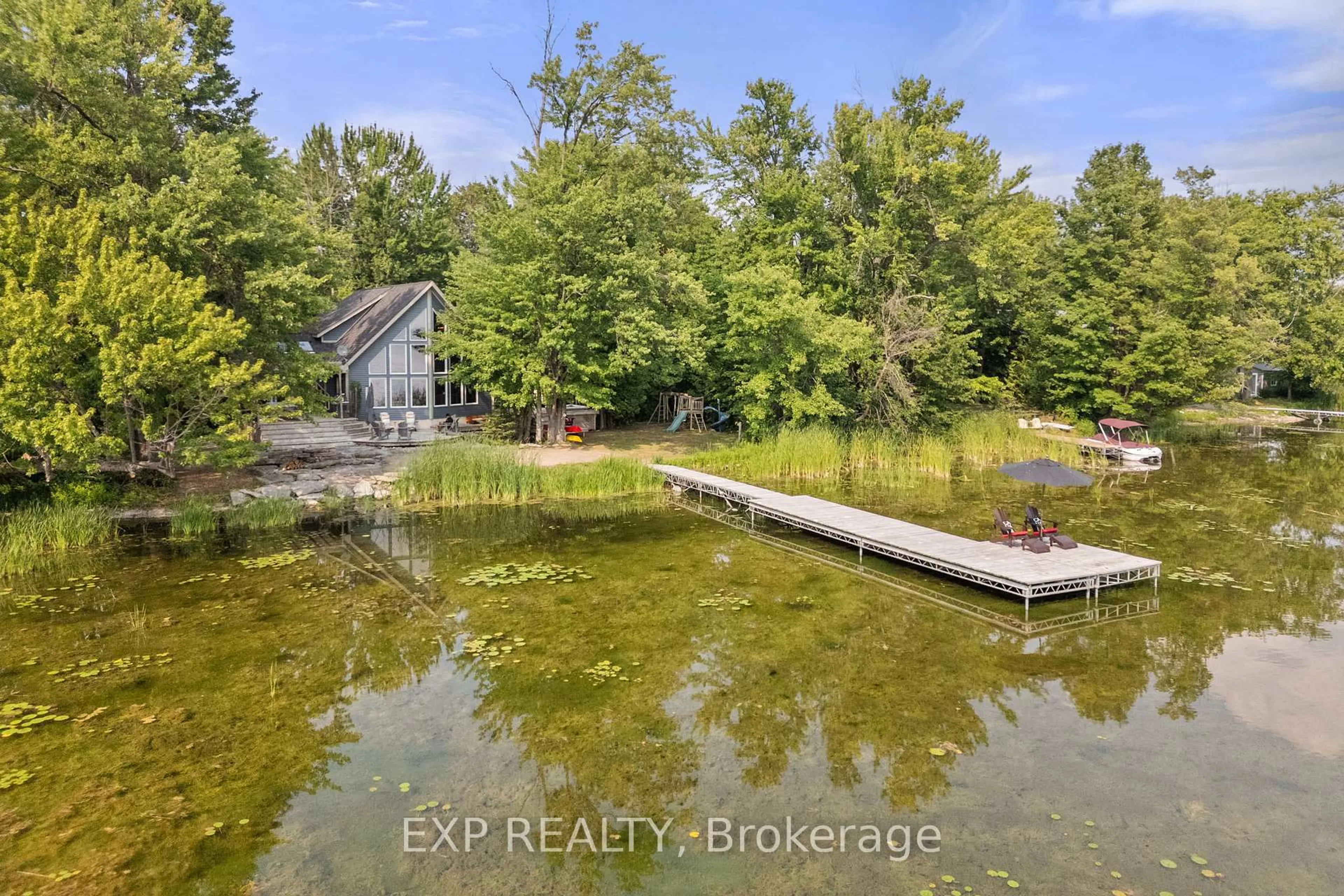 A pic from outside/outdoor area/front of a property/back of a property/a pic from drone, water/lake/river/ocean view for 548 Bear Rd, Georgina Islands Ontario L0E 1R0