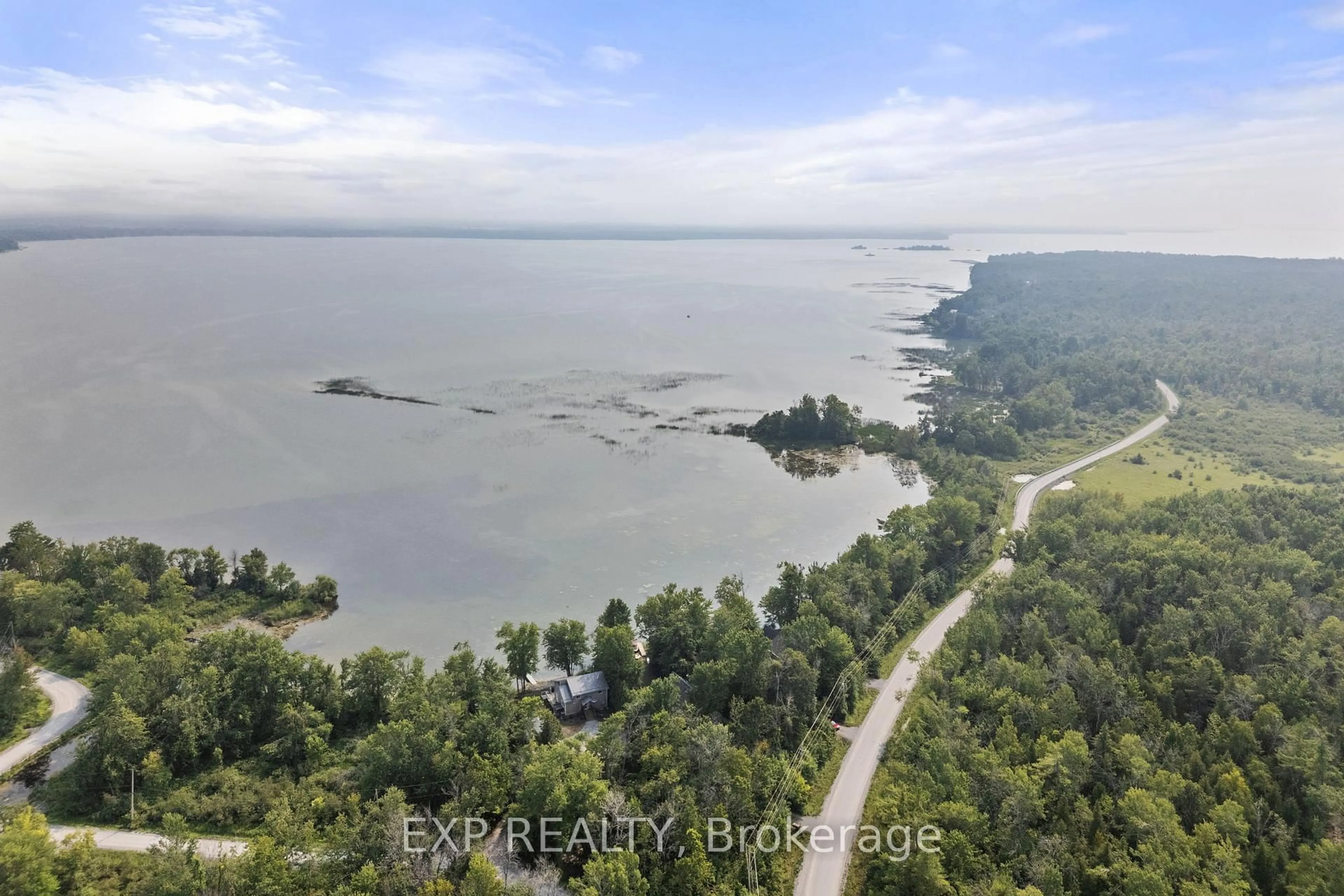 A pic from outside/outdoor area/front of a property/back of a property/a pic from drone, water/lake/river/ocean view for 548 Bear Rd, Georgina Islands Ontario L0E 1R0