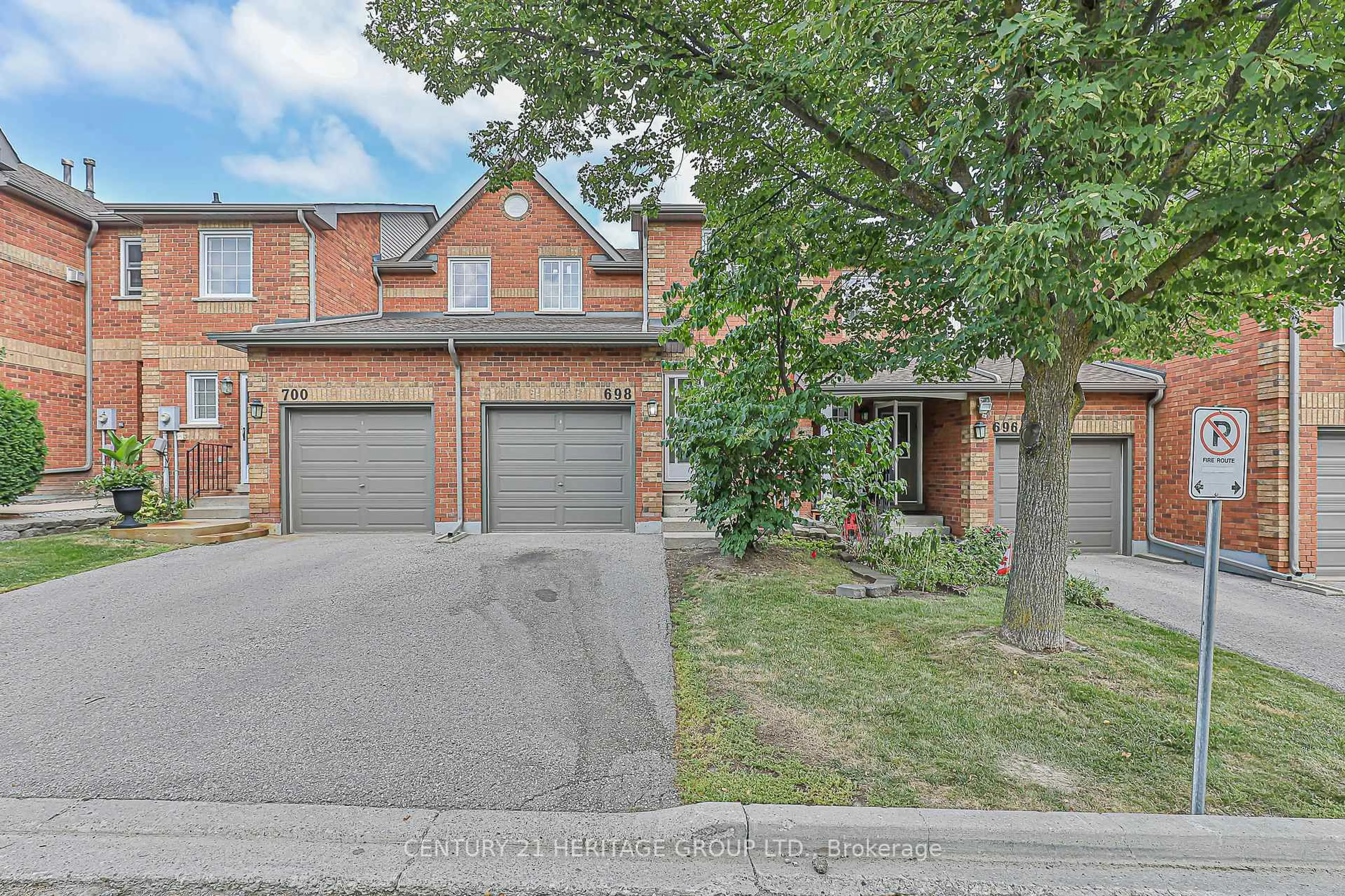 Home with brick exterior material, street for 698 Caradonna Cres #47, Newmarket Ontario L3X 1W6