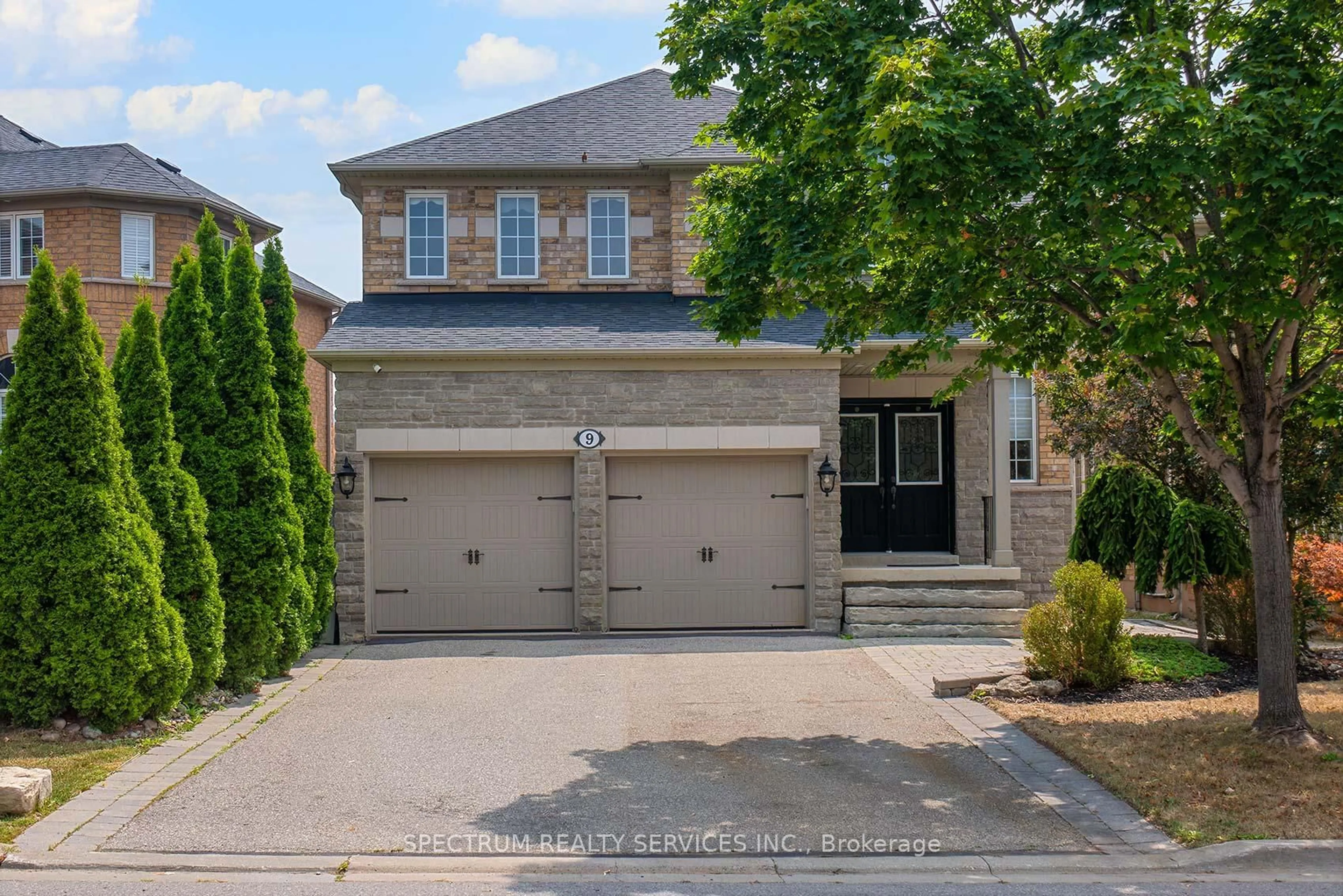 Home with brick exterior material, street for 9 Tuscan Woods Tr, Vaughan Ontario L4H 1N2