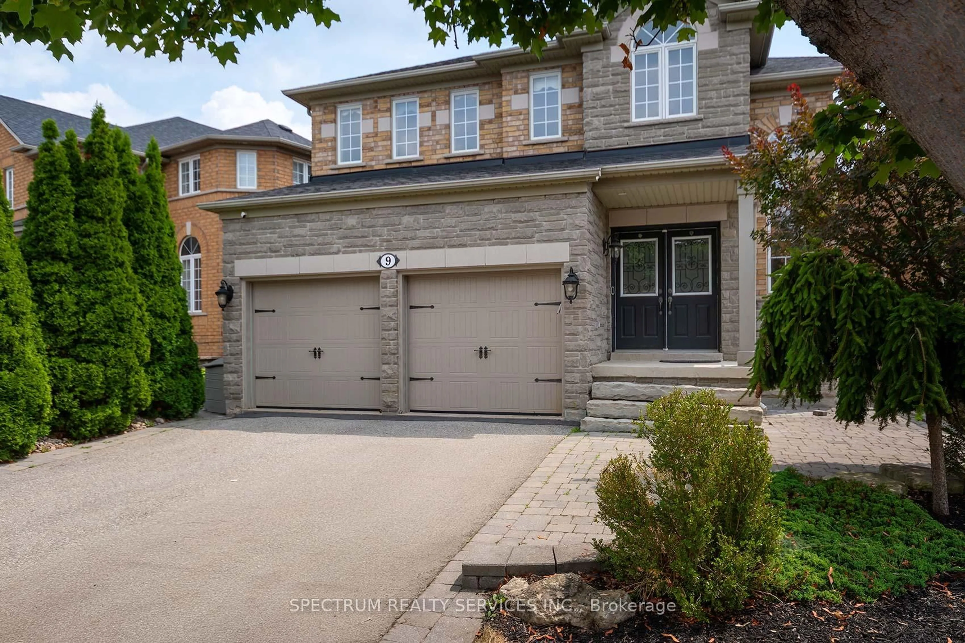 Home with brick exterior material, street for 9 Tuscan Woods Tr, Vaughan Ontario L4H 1N2