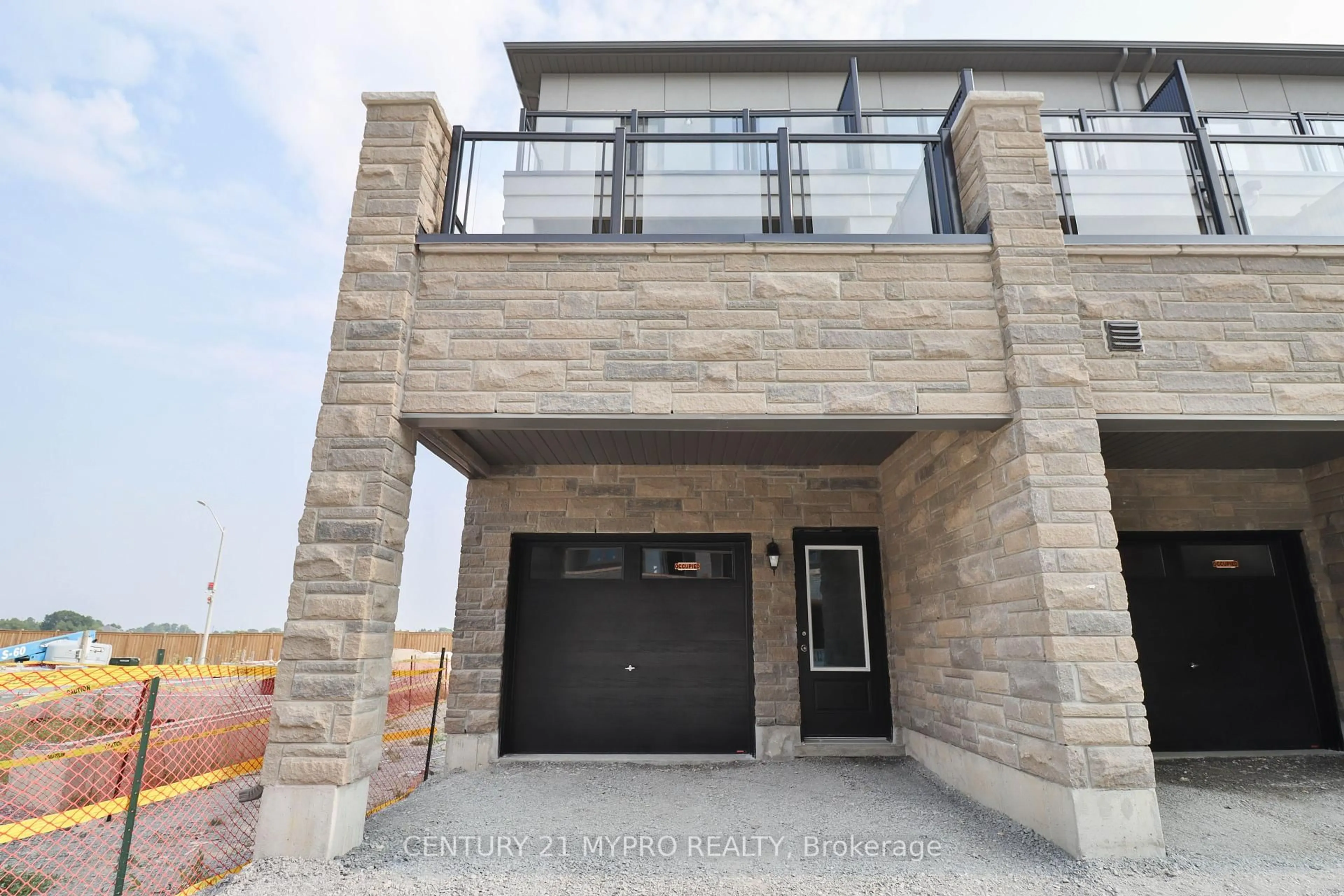 Home with brick exterior material, street for 177 Berczy Green Dr, Markham Ontario L6C 1N3