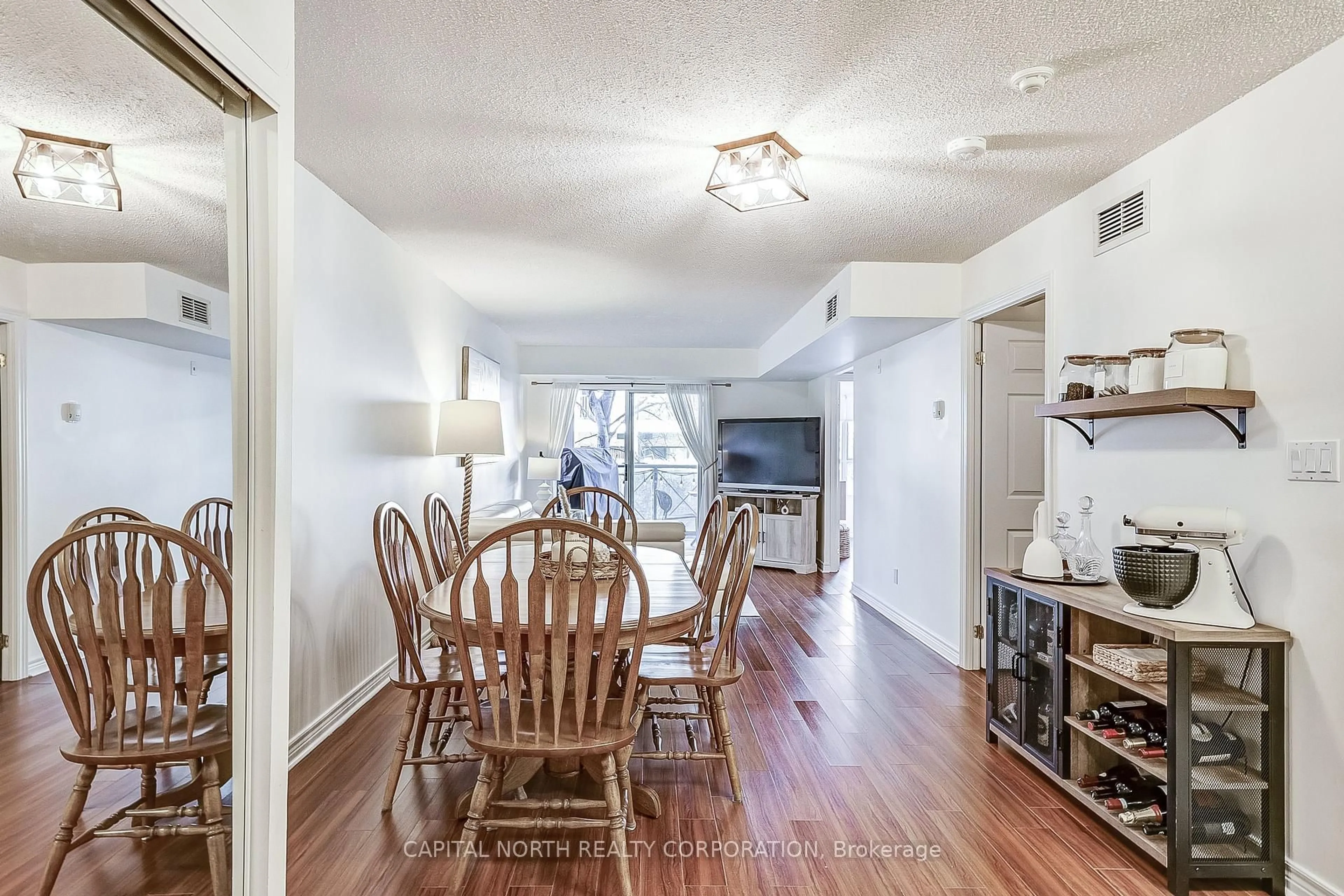 Dining room, wood/laminate floor for 141 Woodbridge Ave #208, Vaughan Ontario L4L 2S6