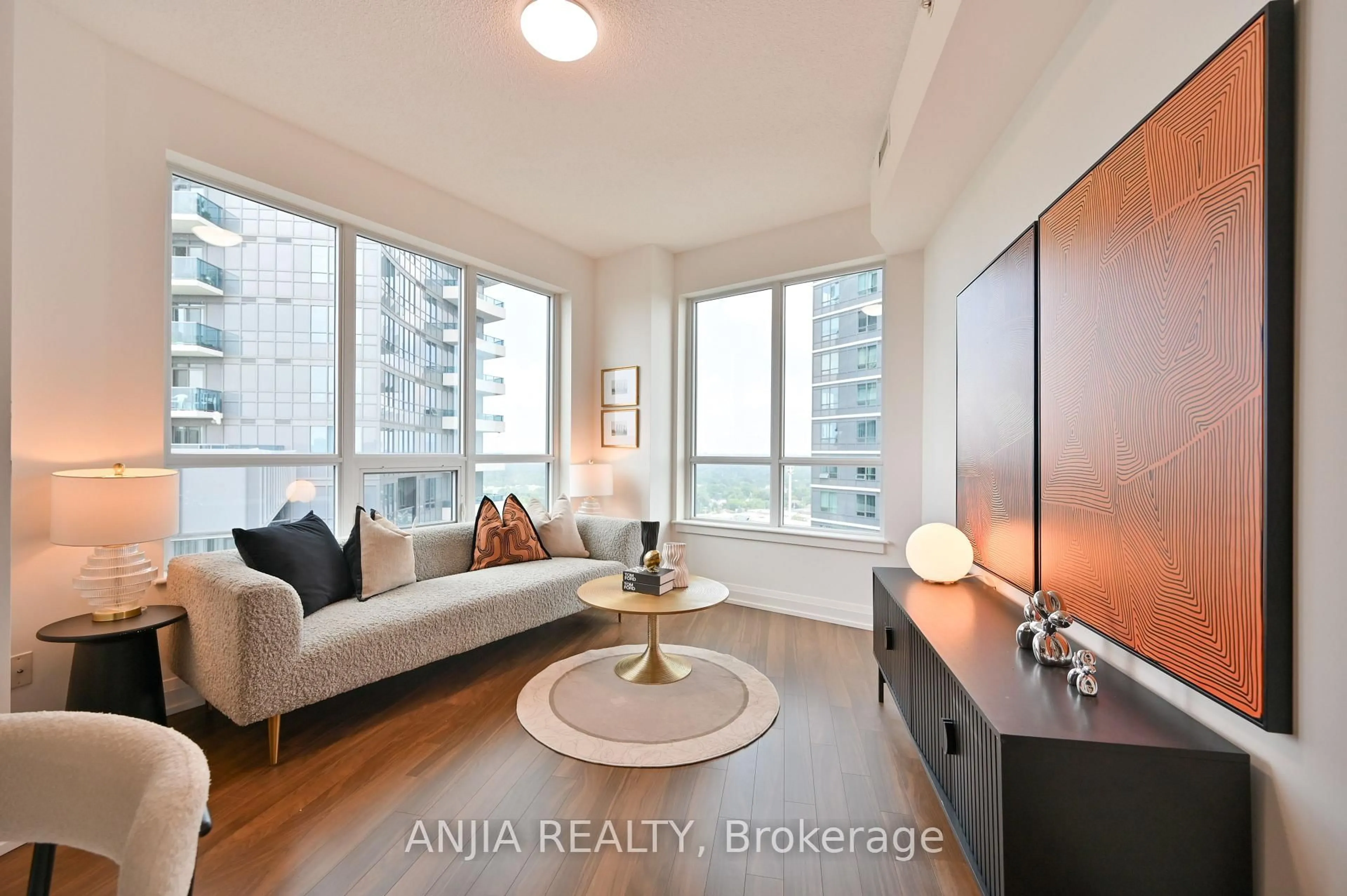 Living room with furniture, wood/laminate floor for 7161 Yonge St #1032, Markham Ontario L3T 0C8