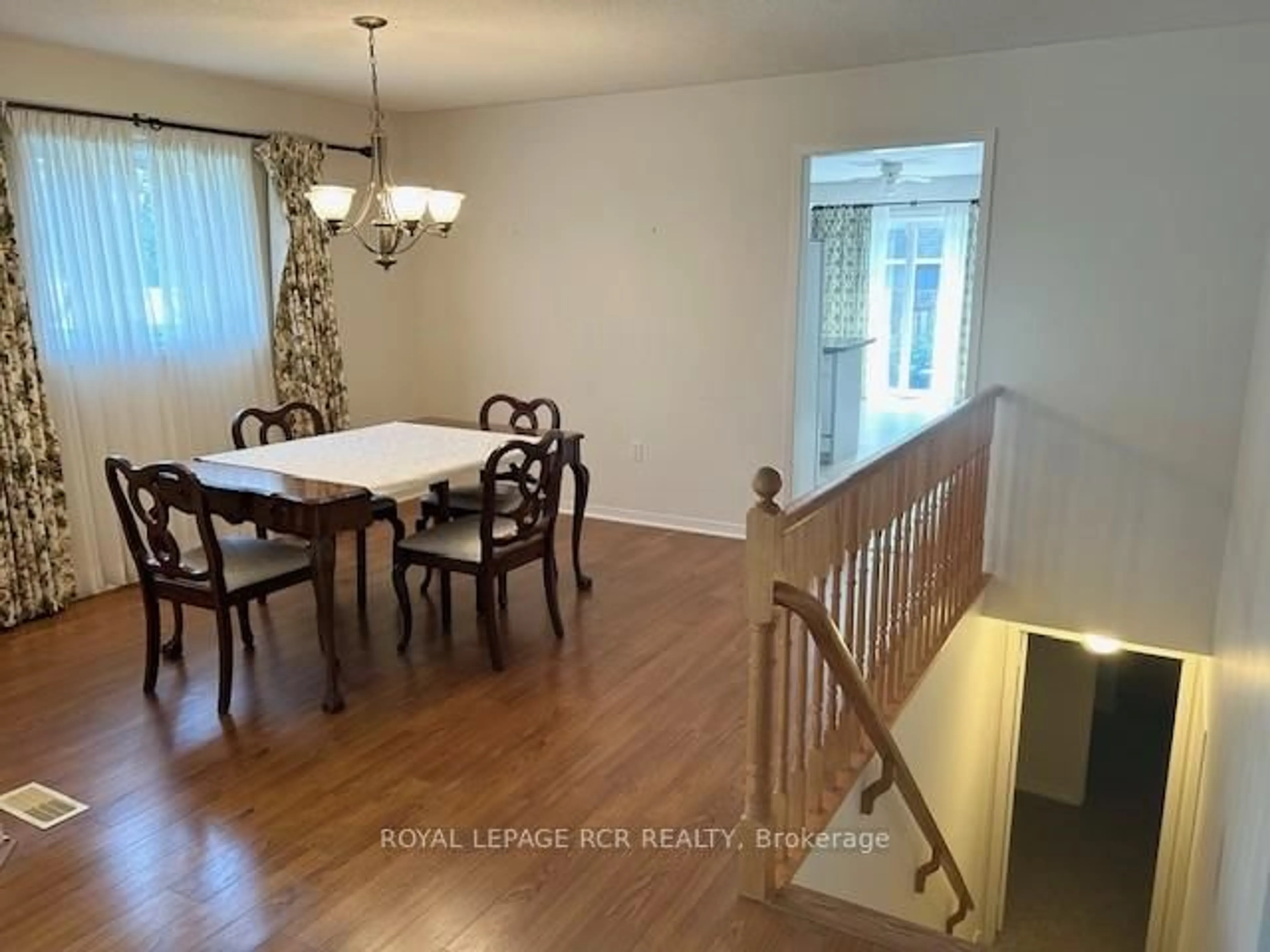 Dining room, wood/laminate floor for 1 Henderson Cres, New Tecumseth Ontario L9R 1Y3