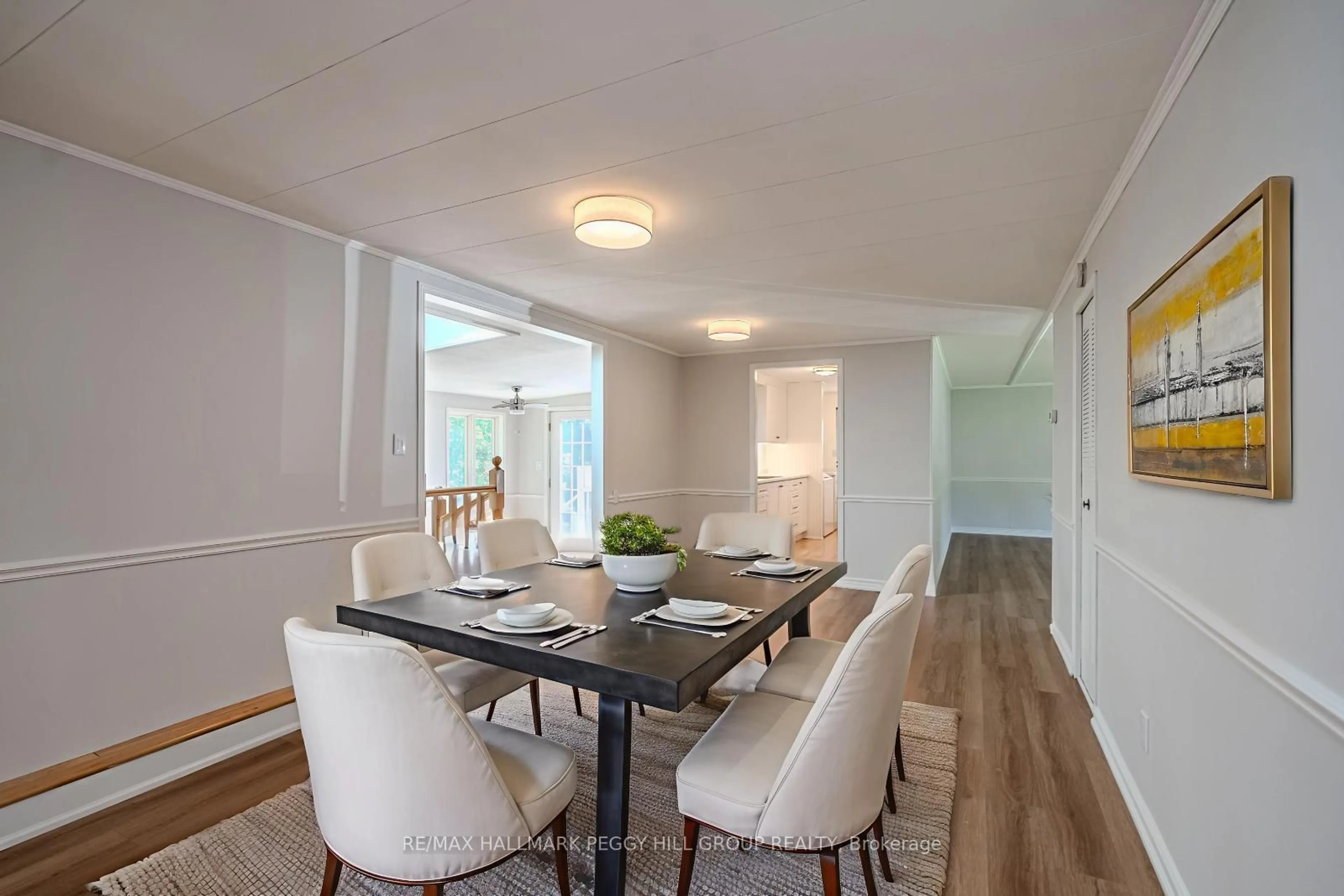 Dining room, wood/laminate floor for 12 Flora Crt, Innisfil Ontario L9S 1R3